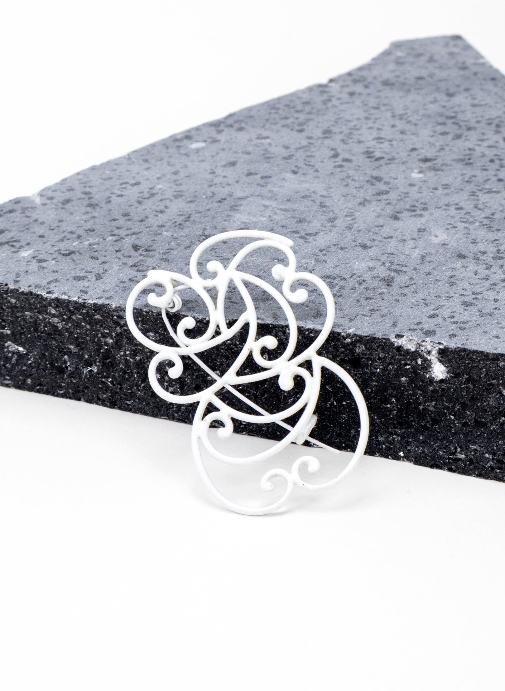 Koru Brooch Bronze/White