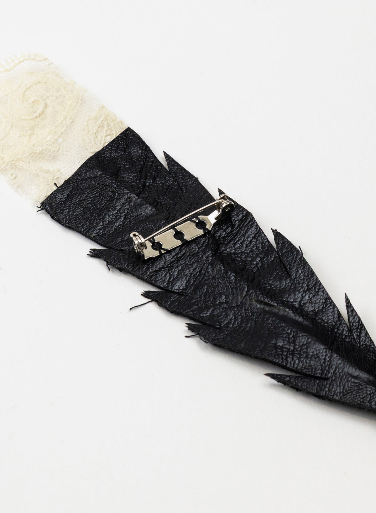 Single Huia Feather Brooch