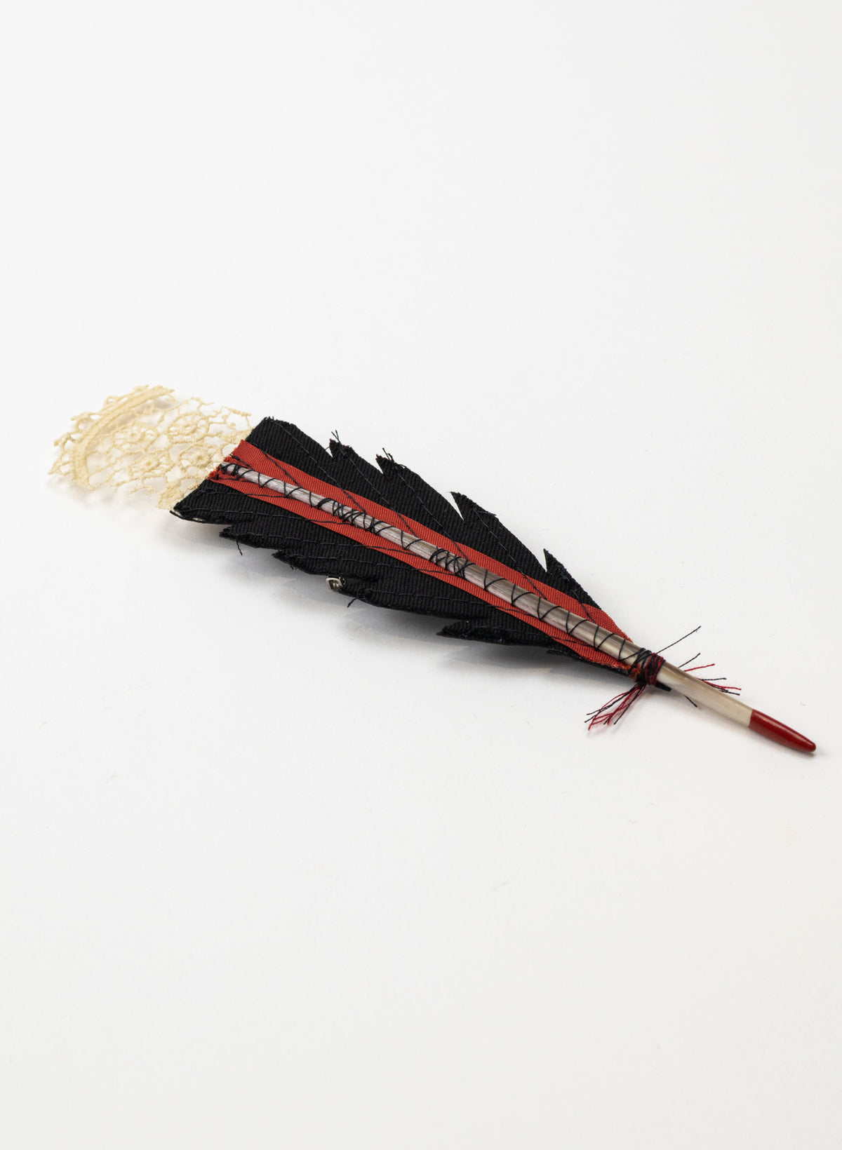 Single Huia Feather Brooch