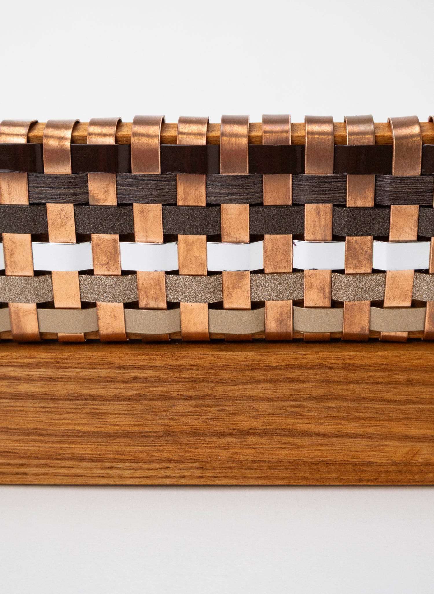 Golden Earth and Copper Waka on Plinth