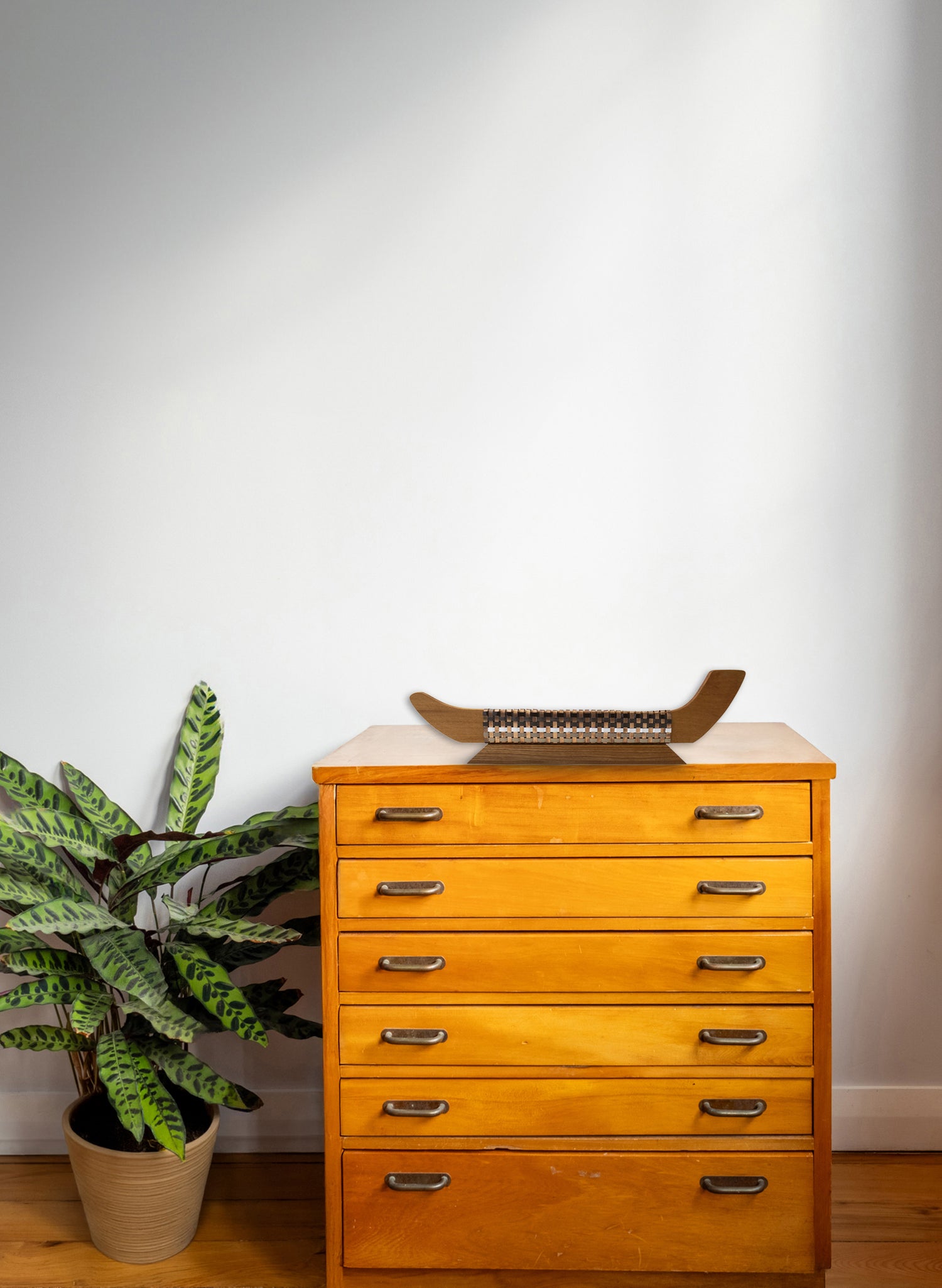 Golden Earth and Copper Waka on Plinth
