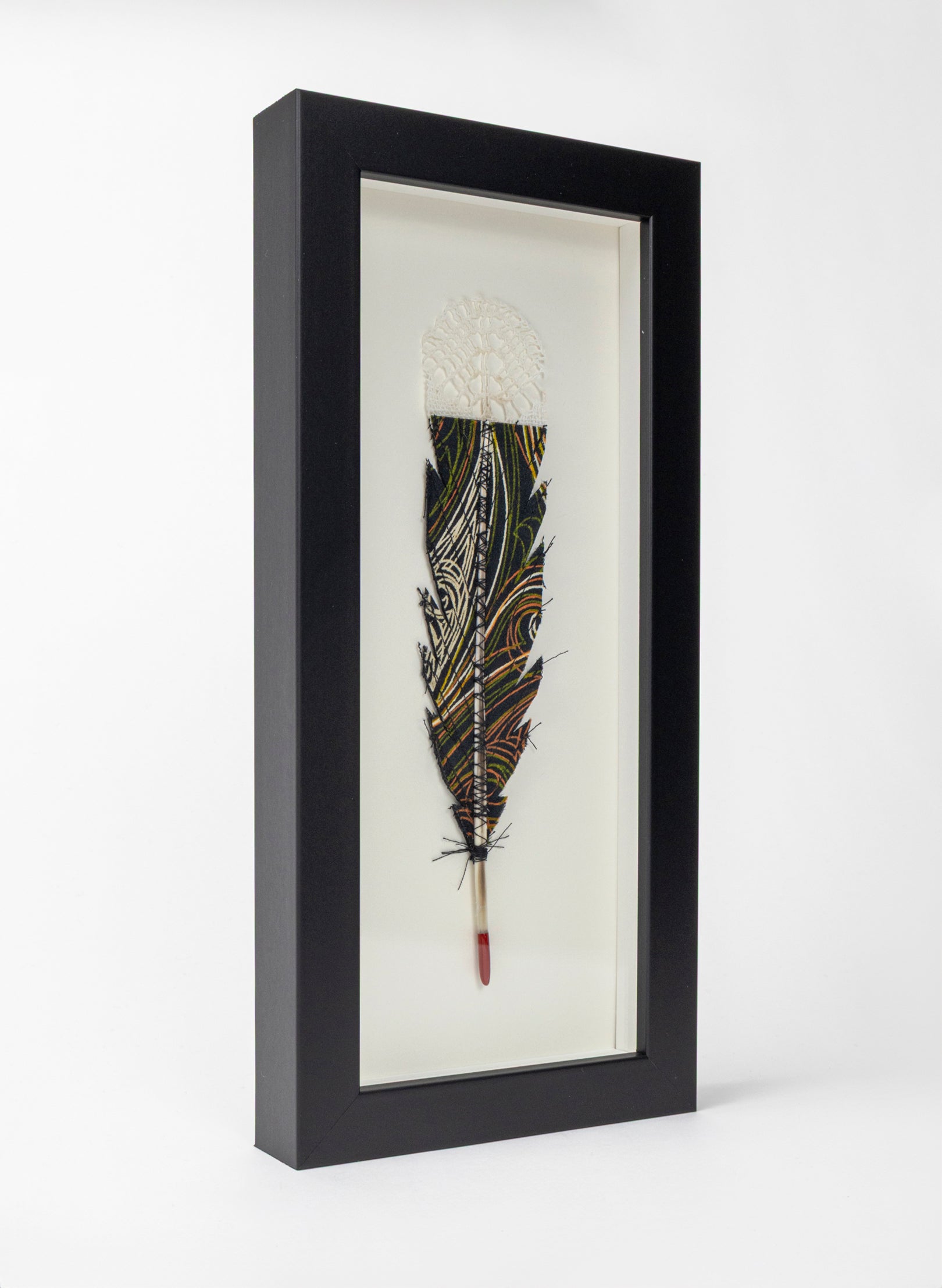 Single Huia Feather Framed