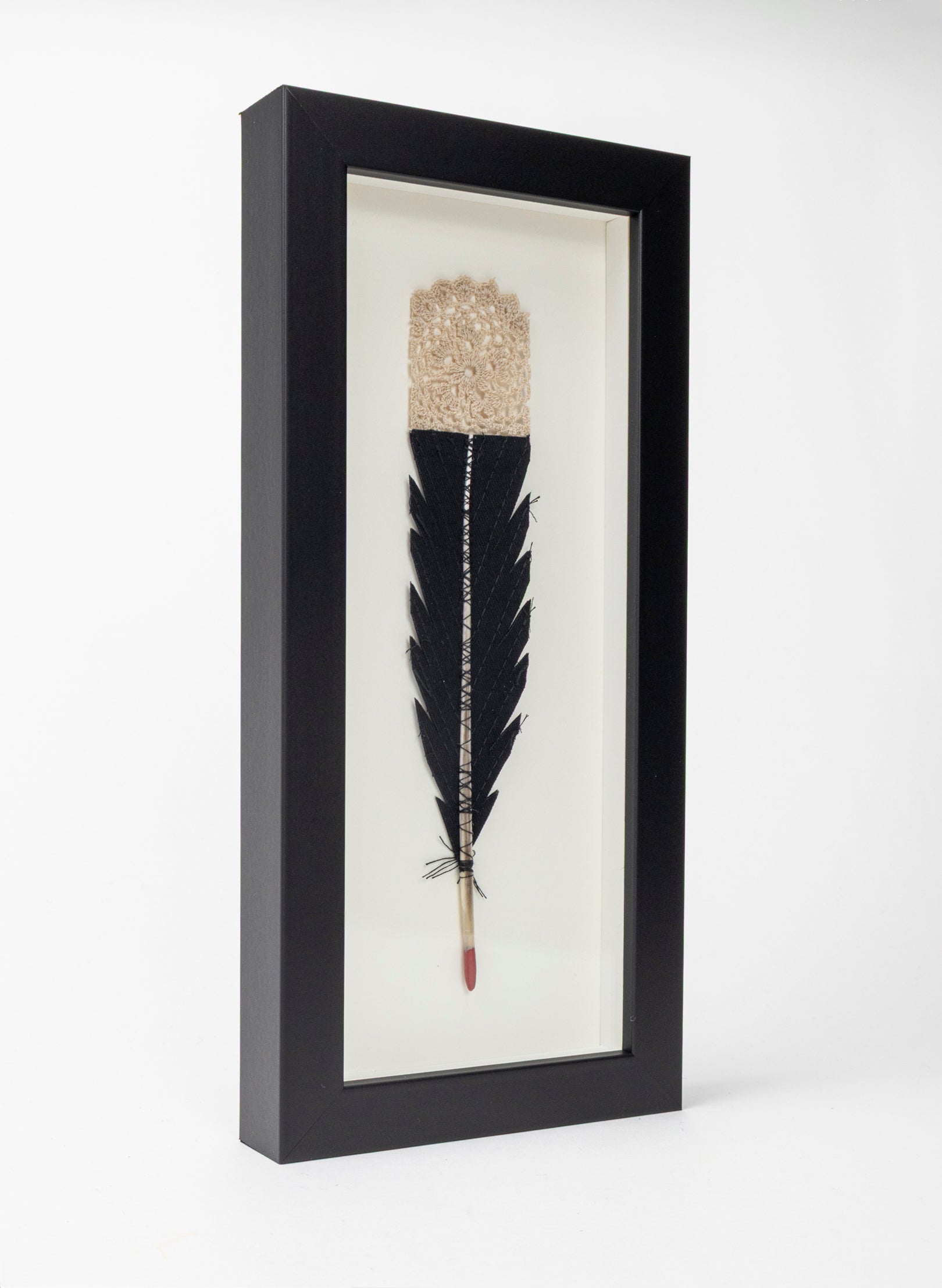 Single Huia Feather Framed