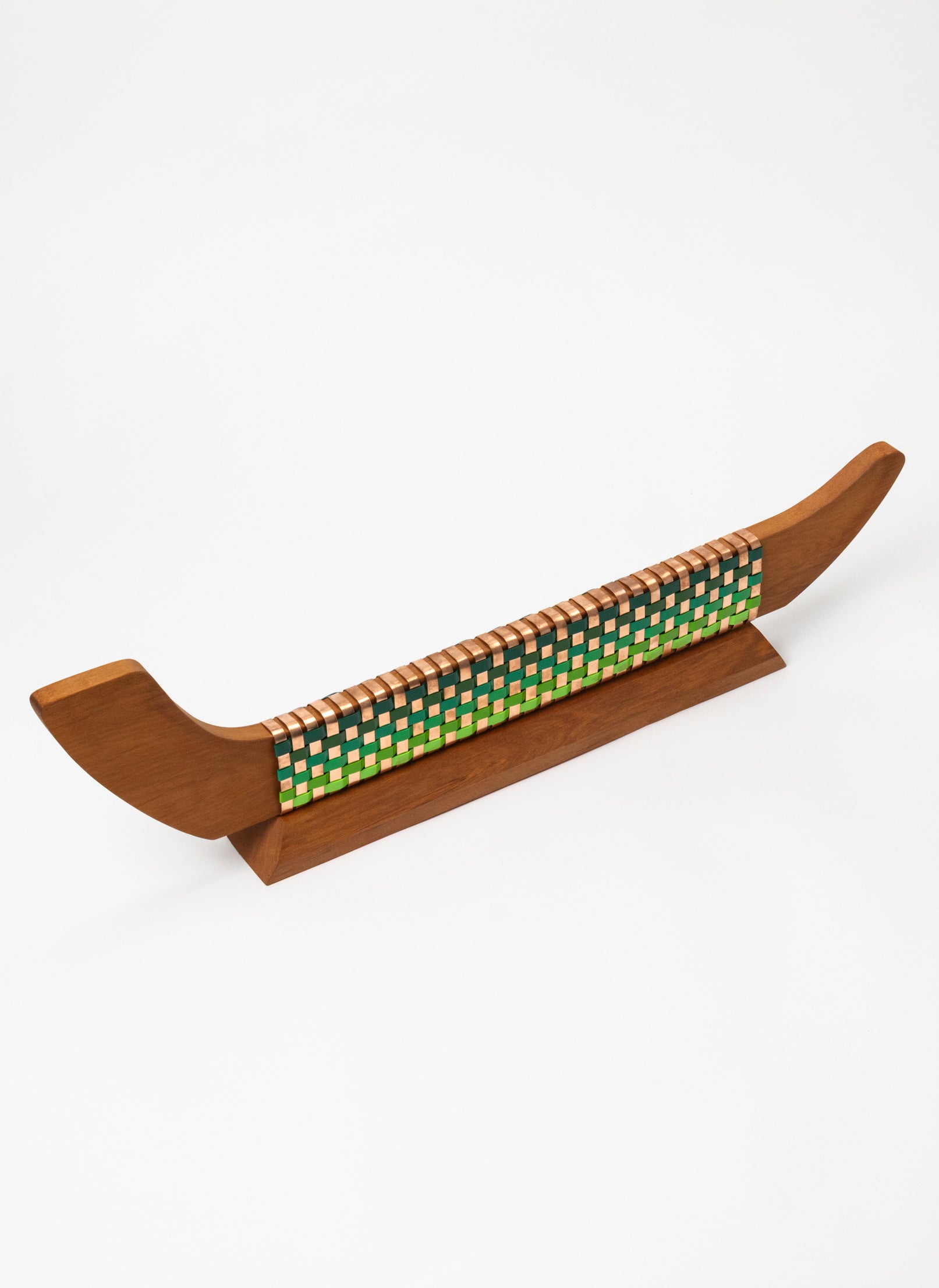 Greens and Copper Waka on Plinth
