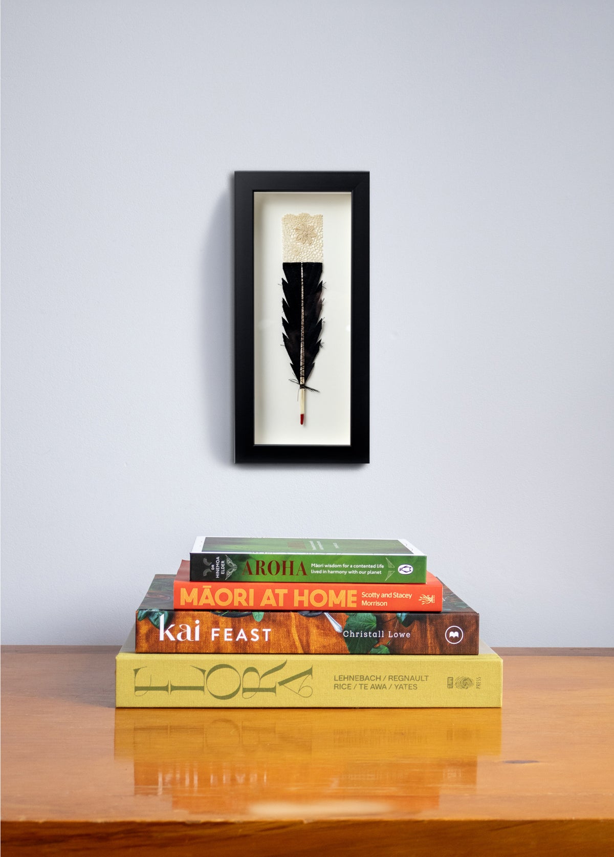 Single Huia Feather Framed