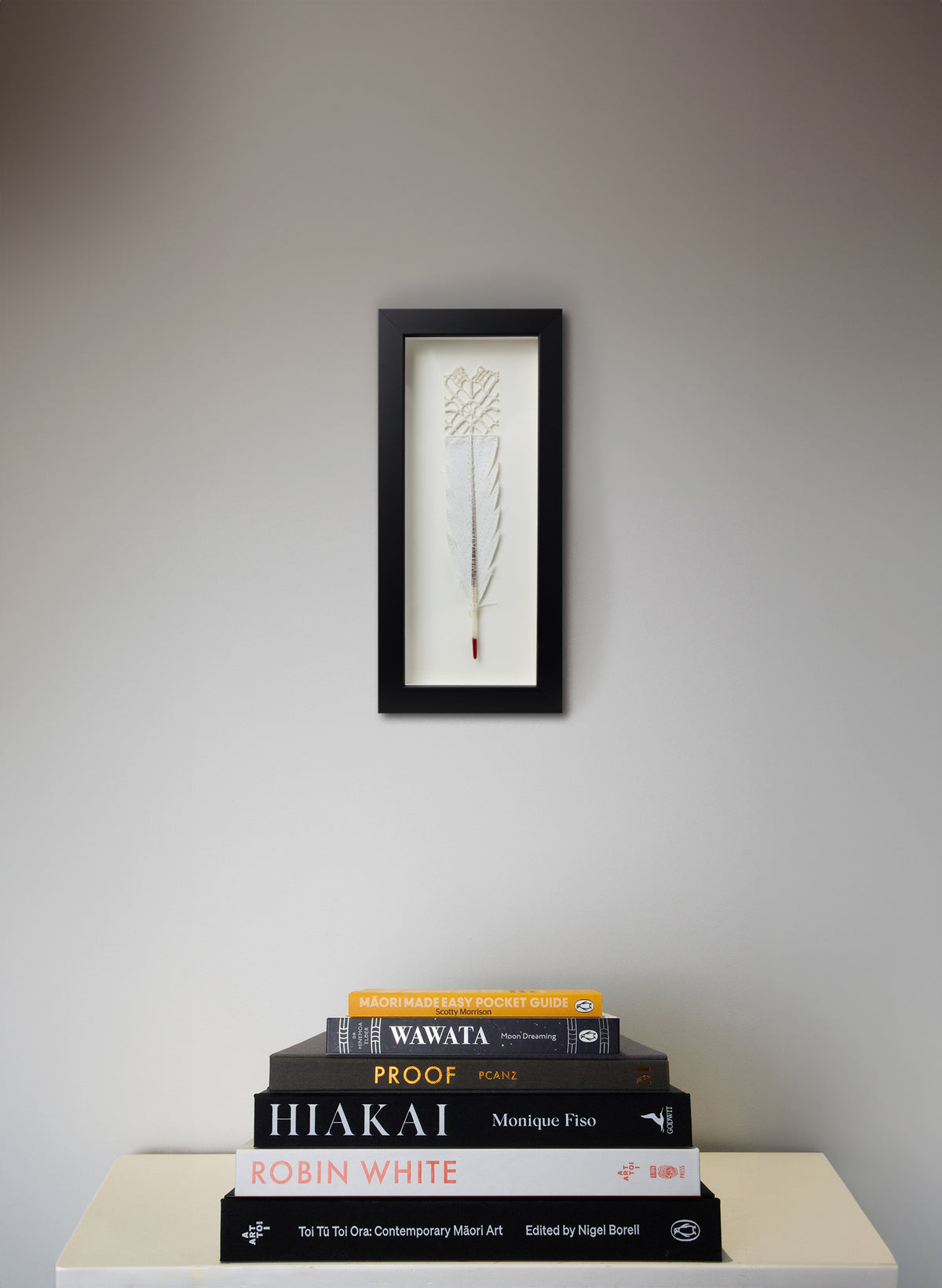 Single Huia Feather Framed