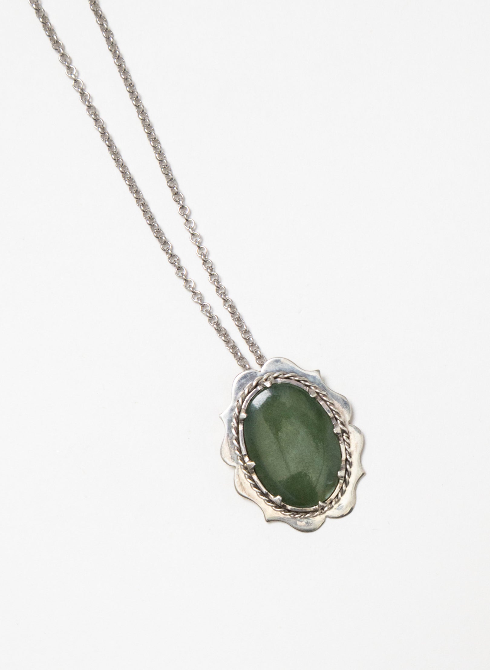 Hei Kaki Silver and Pounamu Pendant