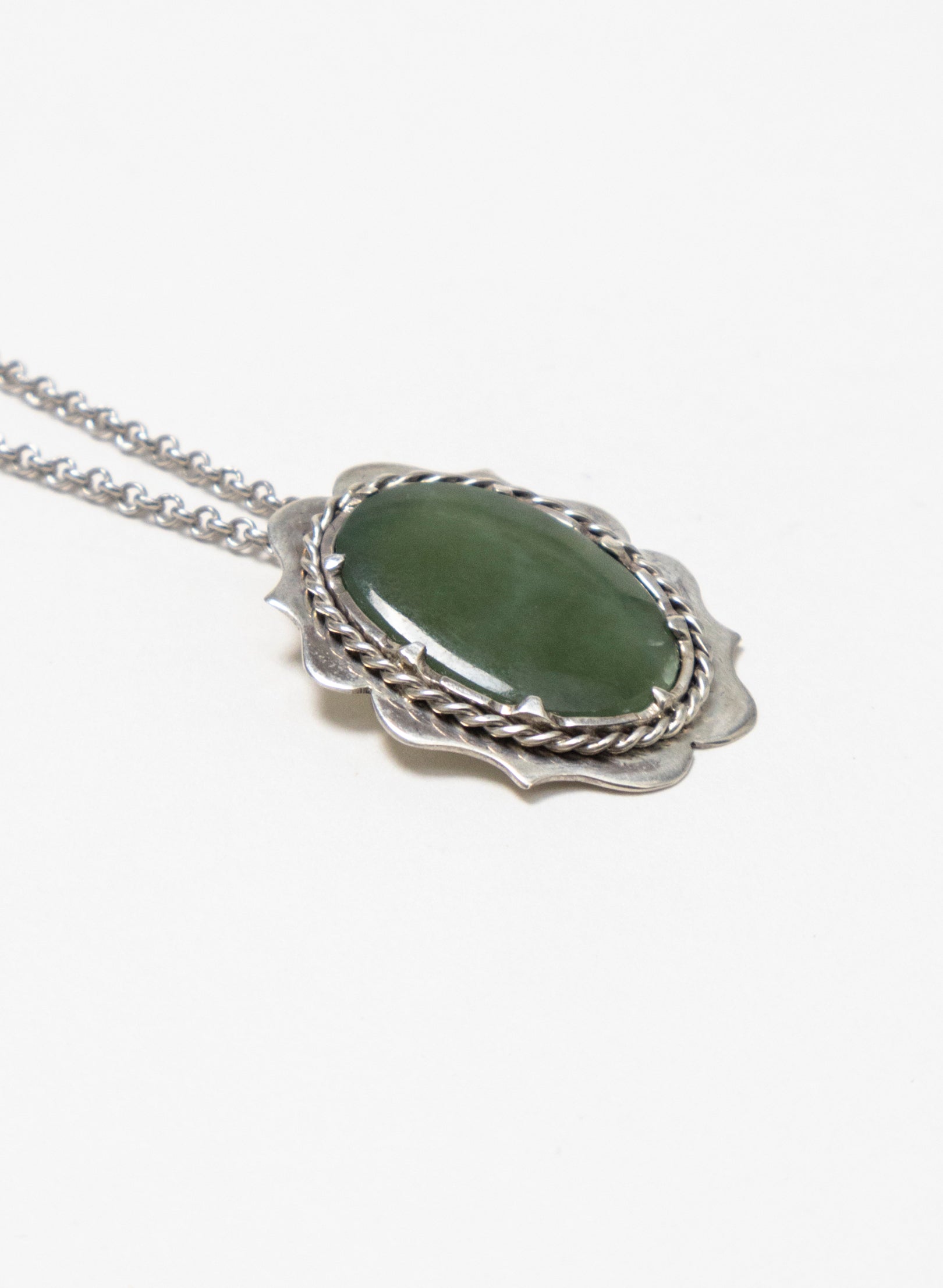 Hei Kaki Silver and Pounamu Pendant