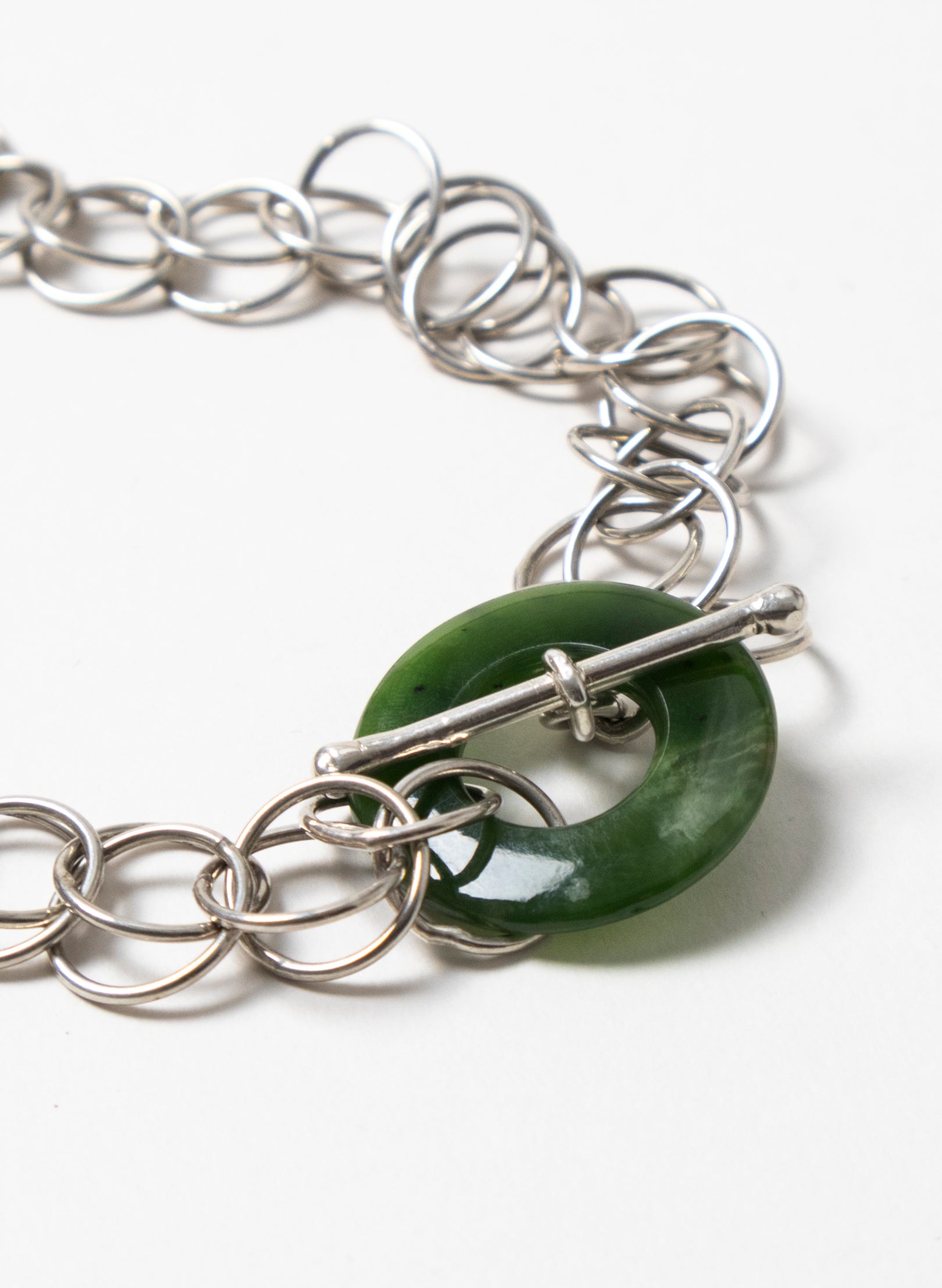 Pounamu Porowhita Disc on a Silver 2 Ring Chainmail Choker
