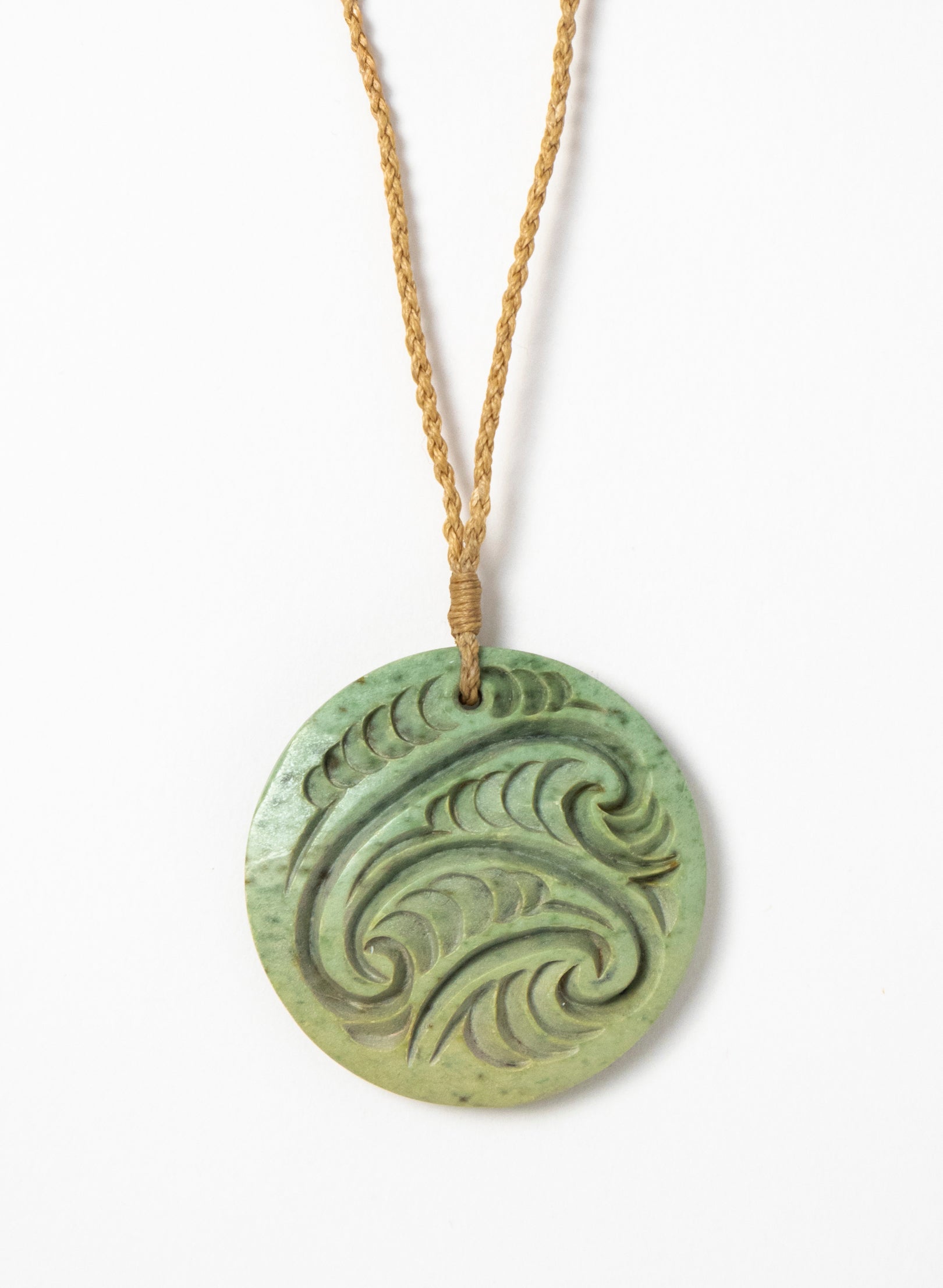 Carved Pounamu Porowhita Disc