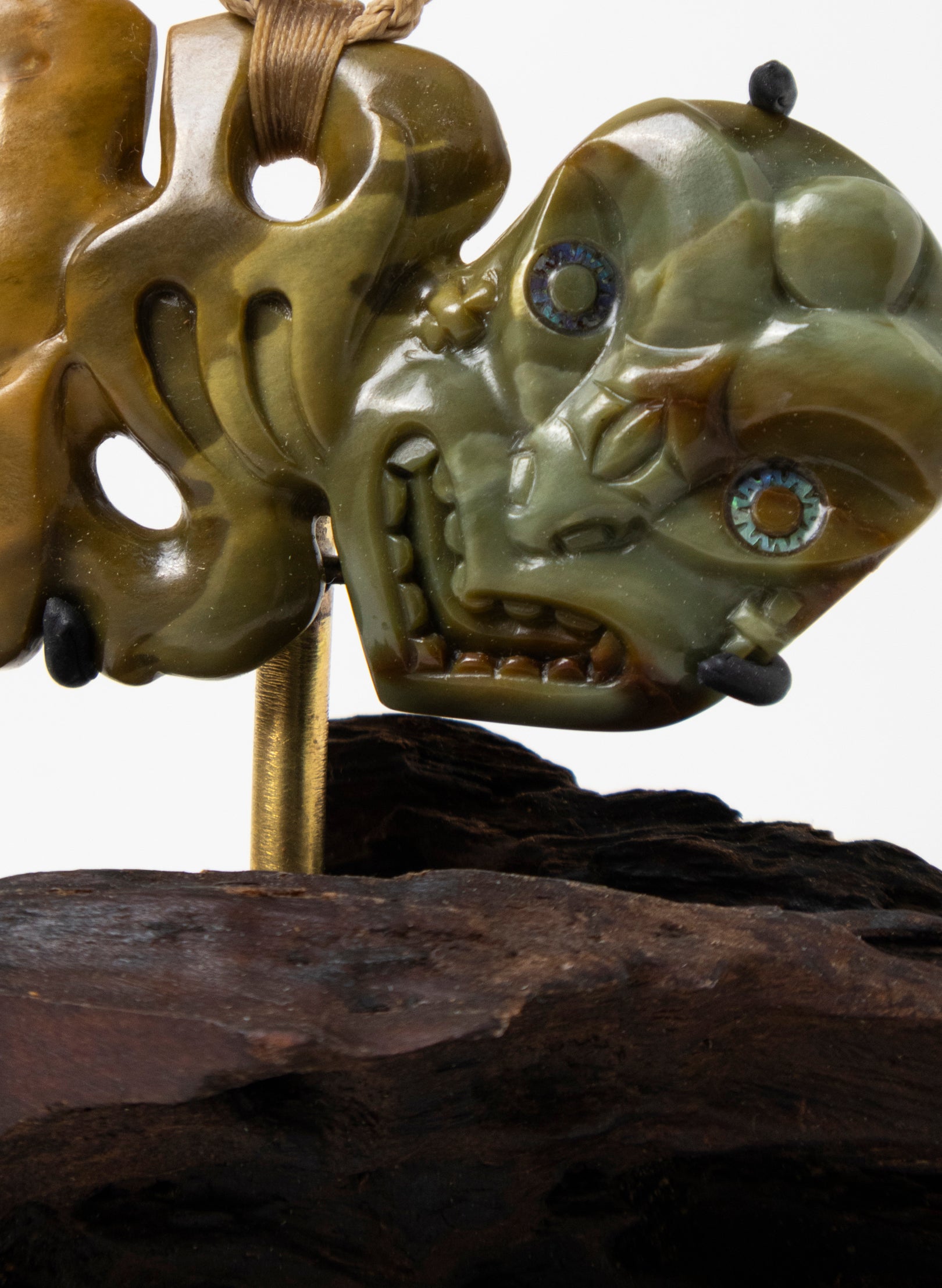 Tupuārangi Hei Tiki on Stand