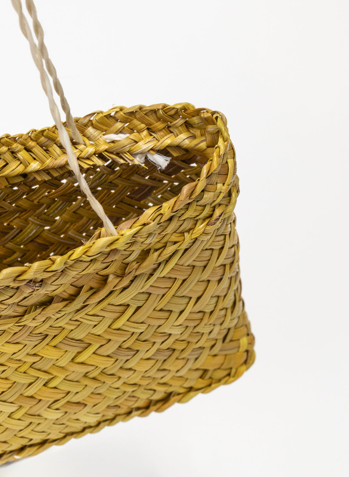 Pingao Kete on a stand
