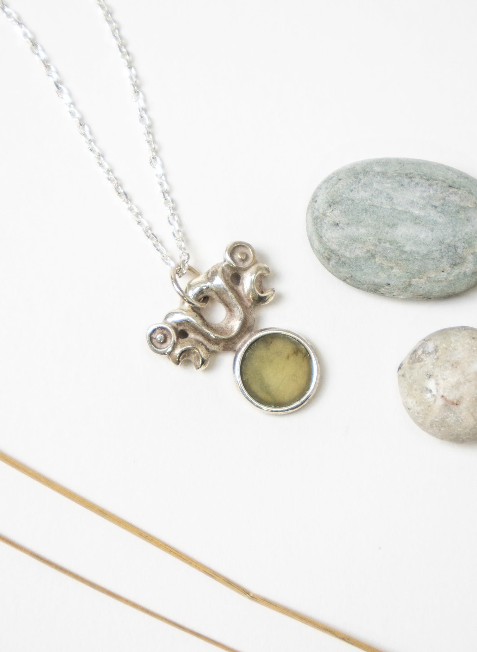 Silver Pekapeka with Pounamu Disc