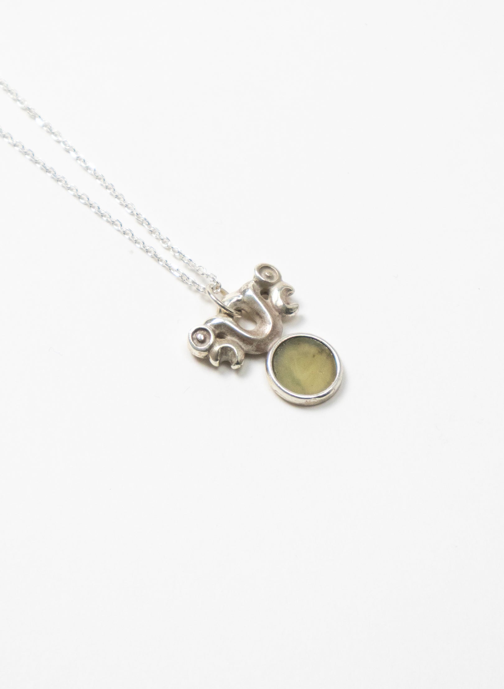 Silver Pekapeka with Pounamu Disc