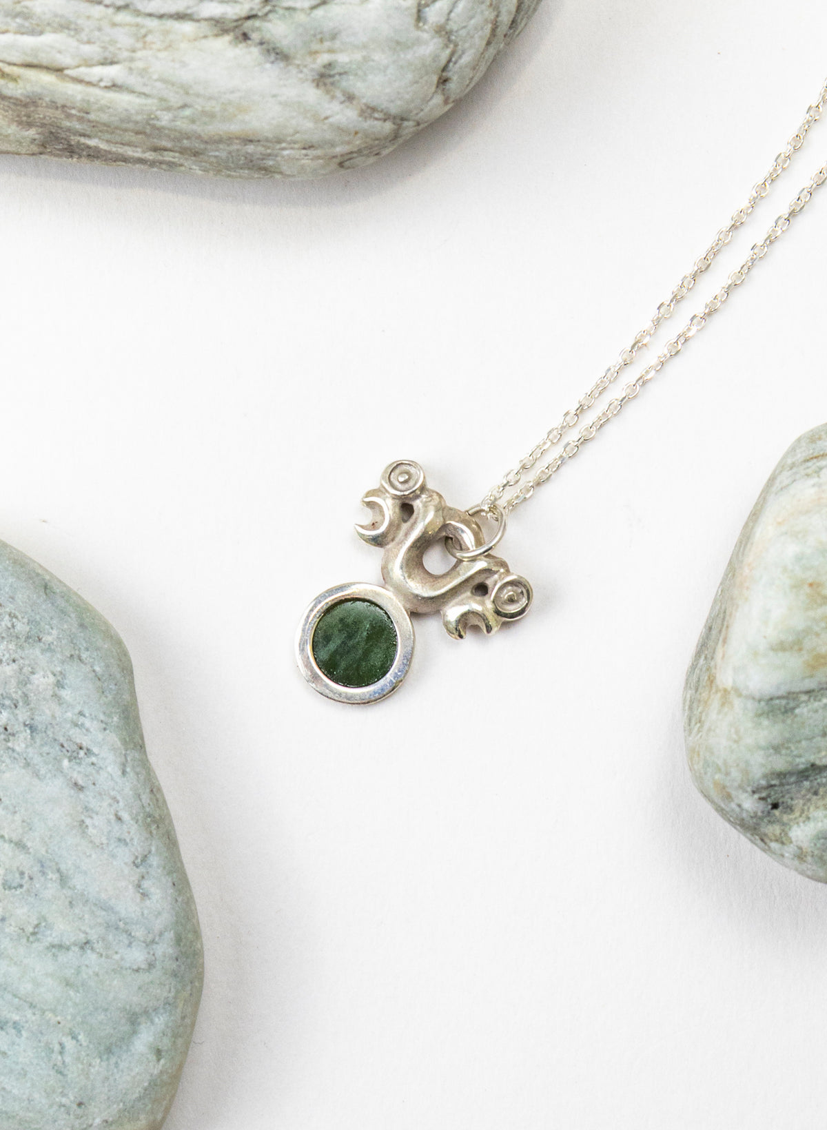 Silver Pekapeka Pendant with Pounamu Disc