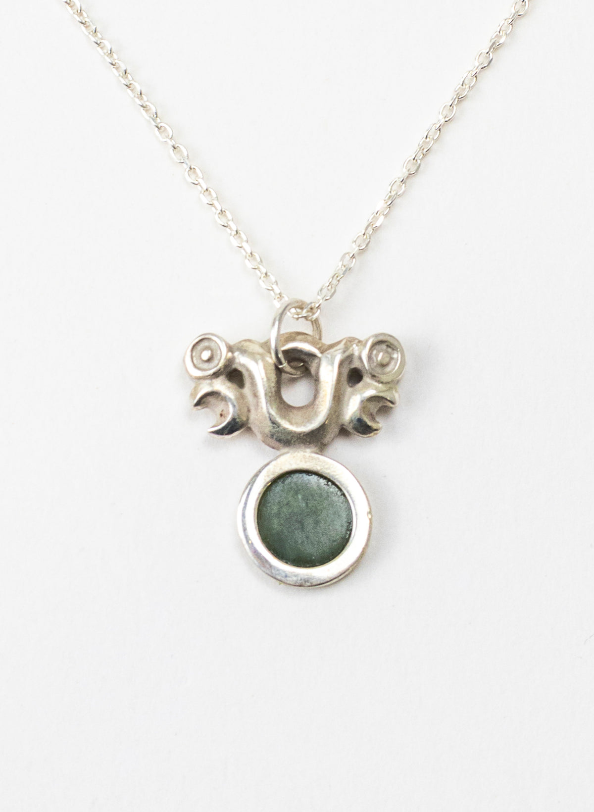 Silver Pekapeka Pendant with Pounamu Disc