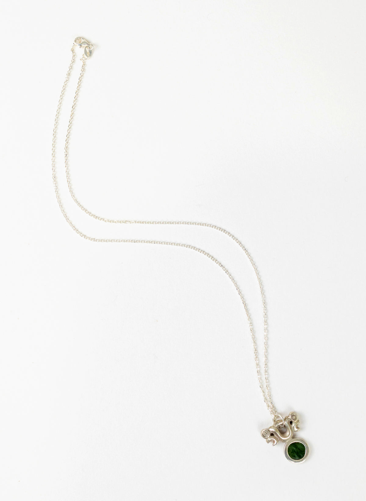 Silver Pekapeka Pendant with Pounamu Disc