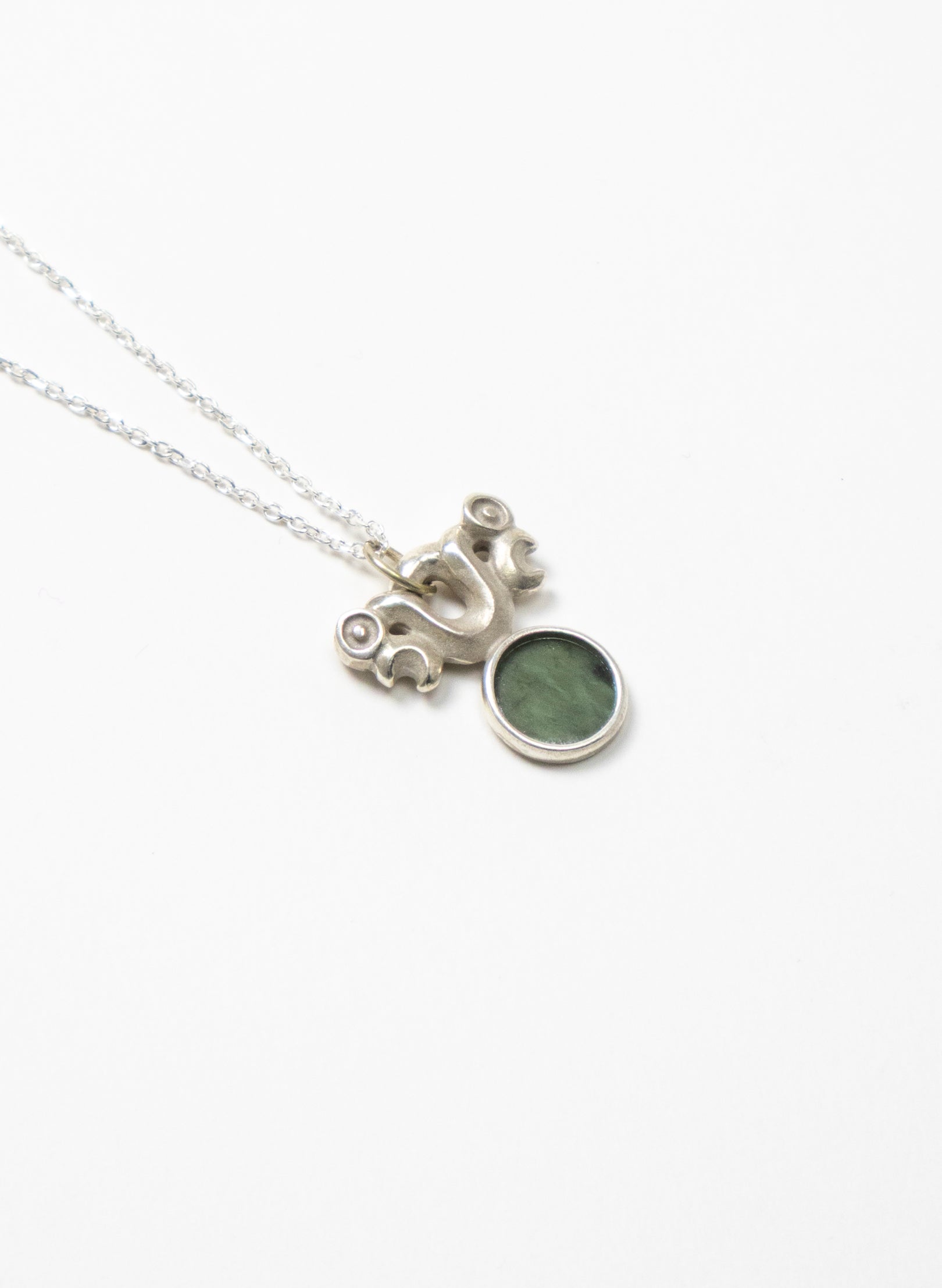 Silver Pekapeka with Pounamu Disc