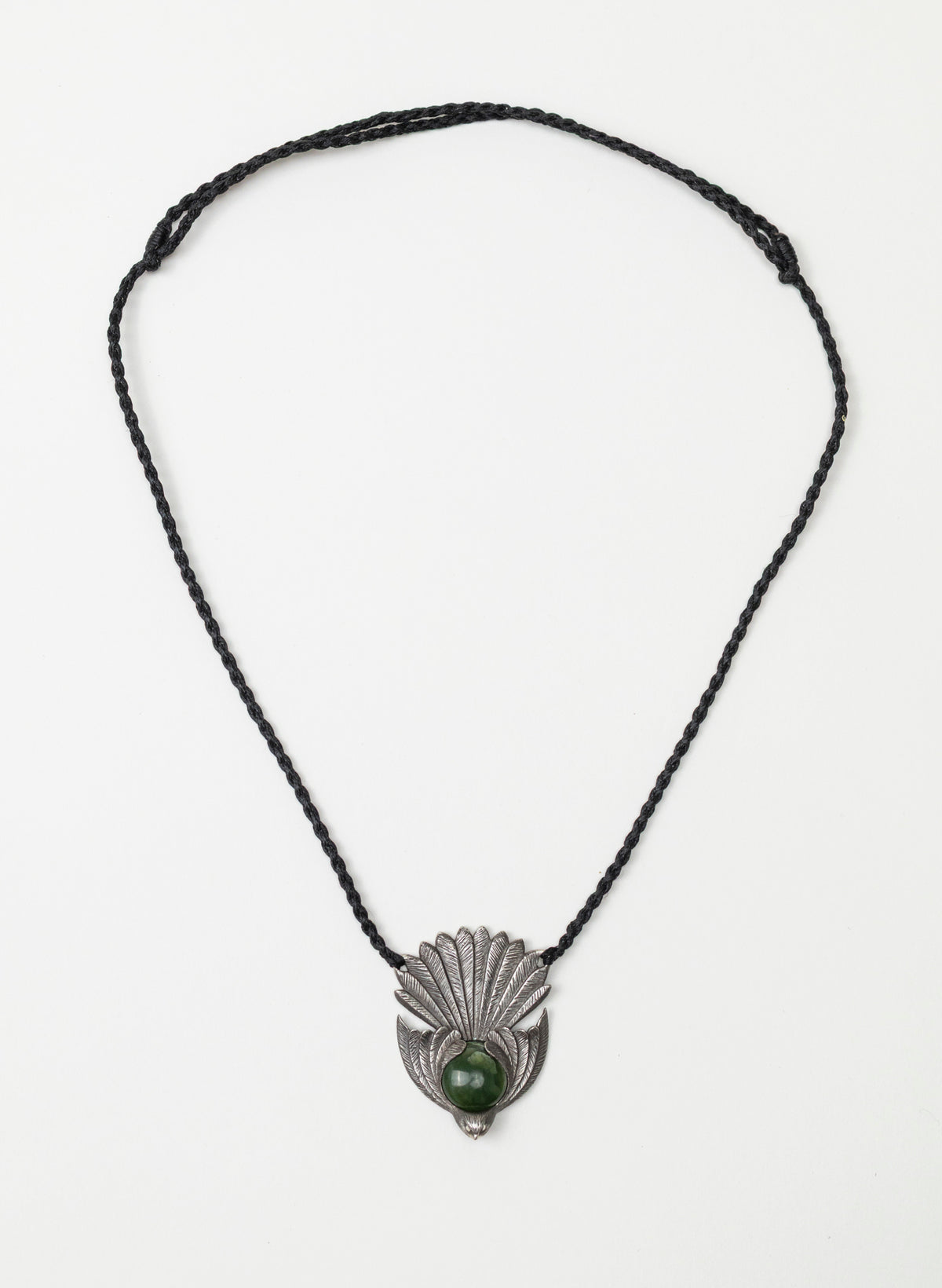 Sterling Silver Piwakawaka Pendant with a Pounamu Insert