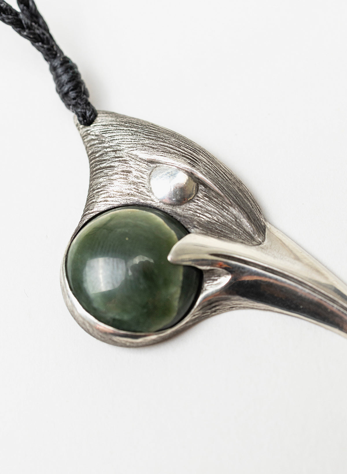 Sterling Silver Male Huia Pendant with a Pounamu Insert