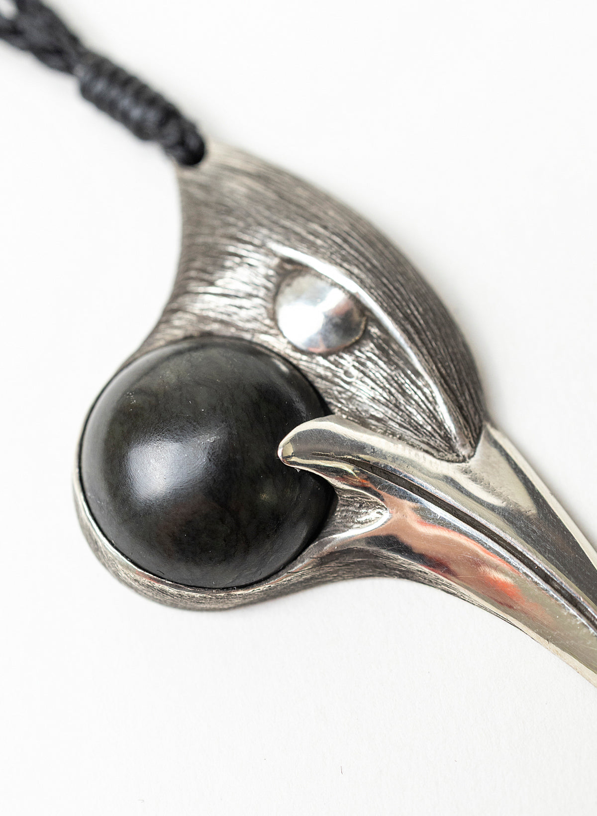 Sterling Silver Male Huia Pendant with a Pounamu Insert