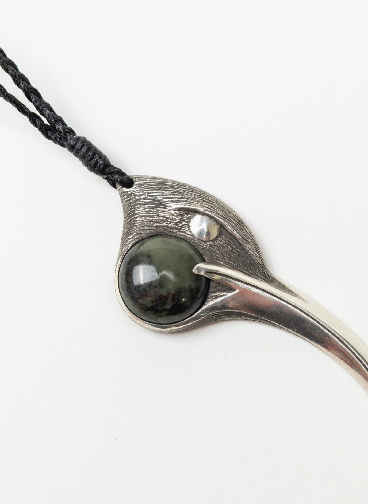 Sterling Silver Female Huia Pendant with a Pounamu Insert