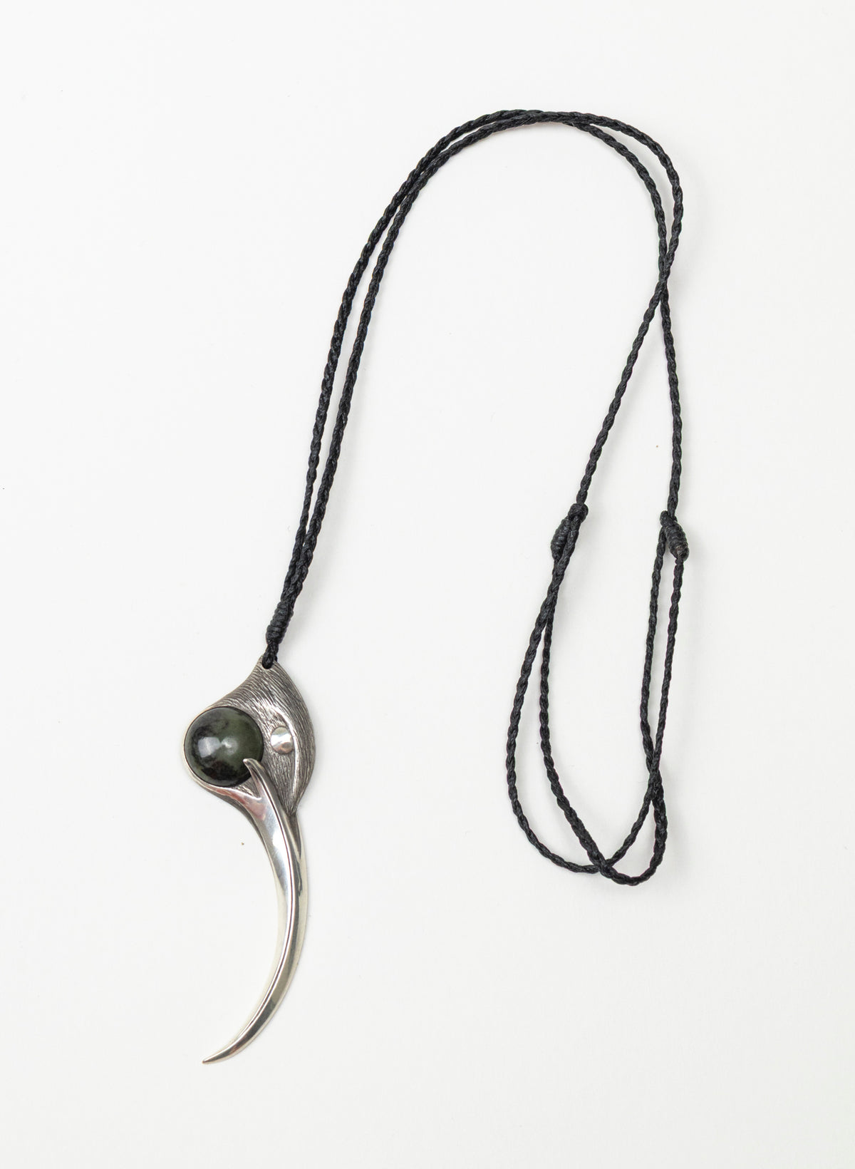 Sterling Silver Female Huia Pendant with a Pounamu Insert