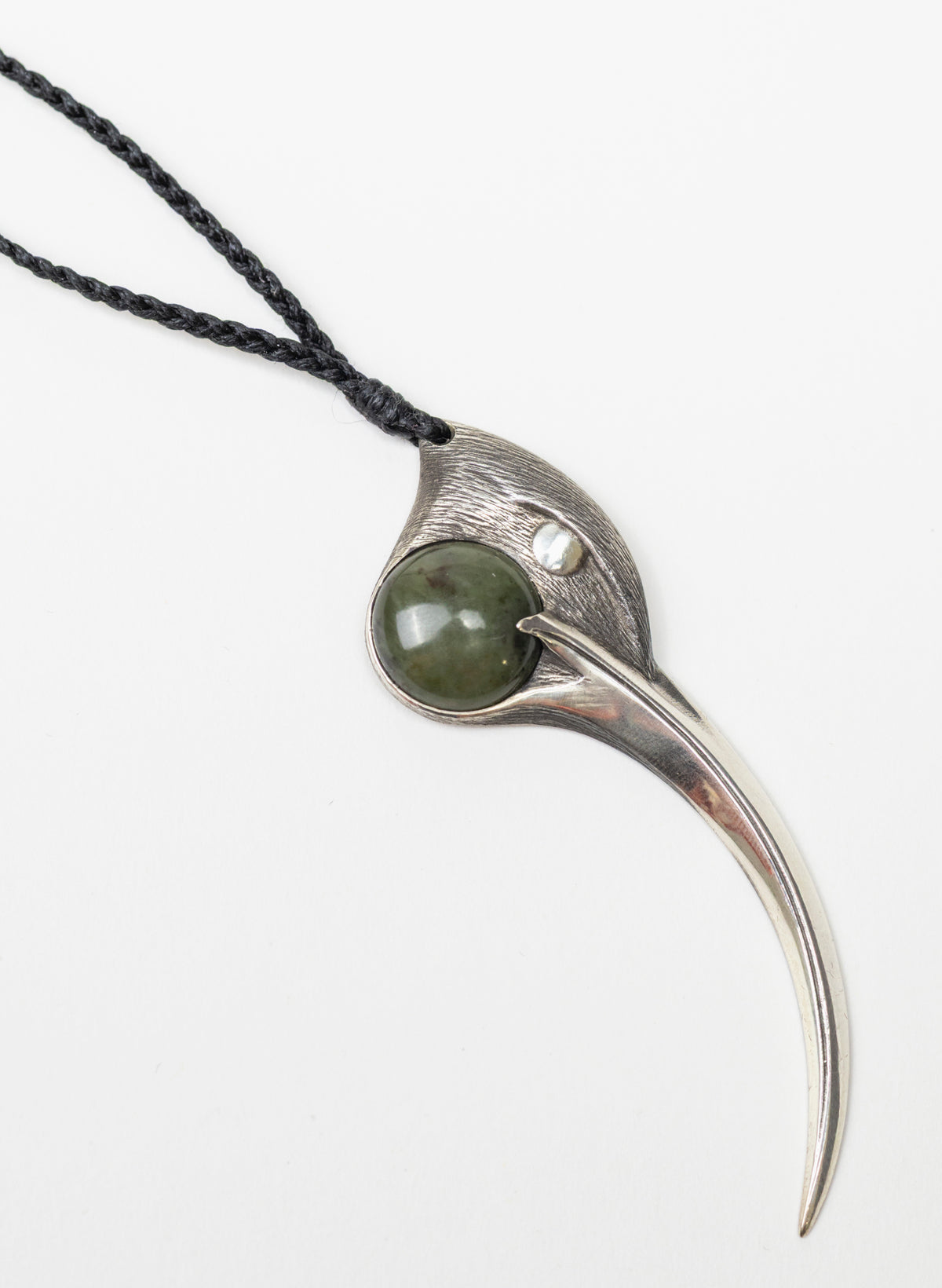 Sterling Silver Female Huia Pendant with a Pounamu Insert