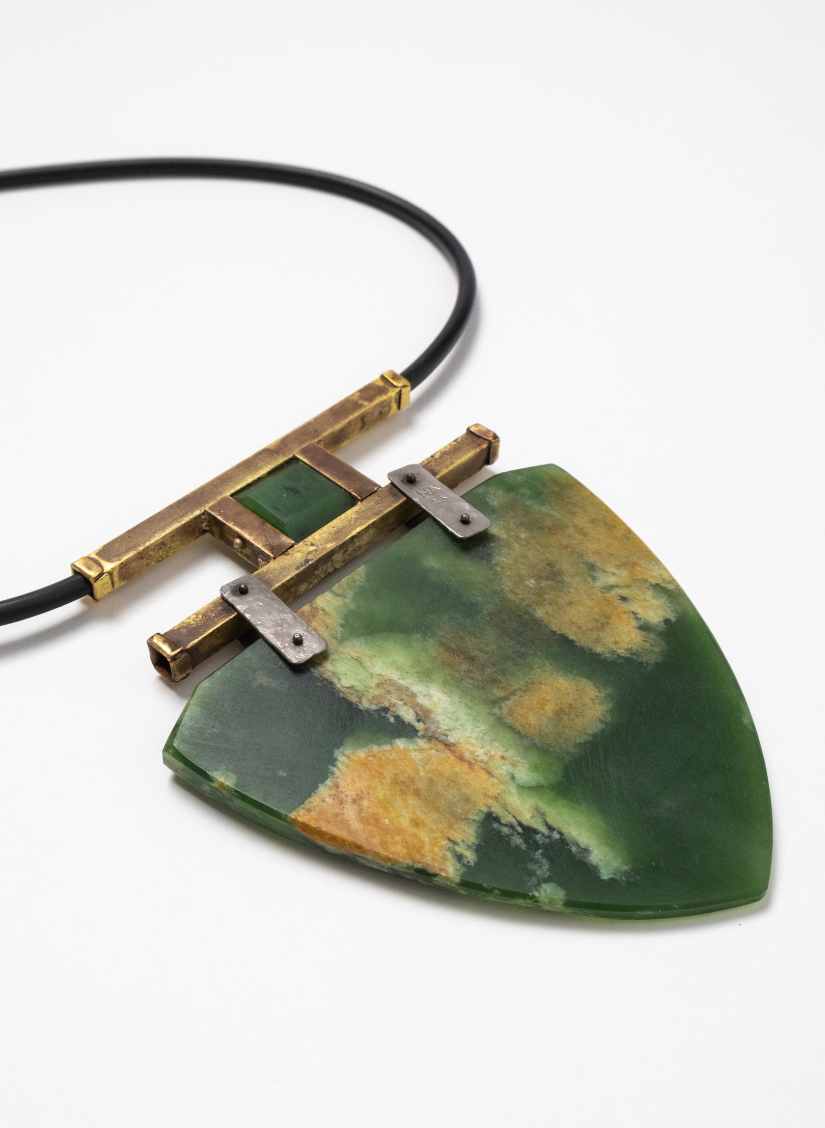 Brass, Rubber and NZ Pounamu Necklace with Stand