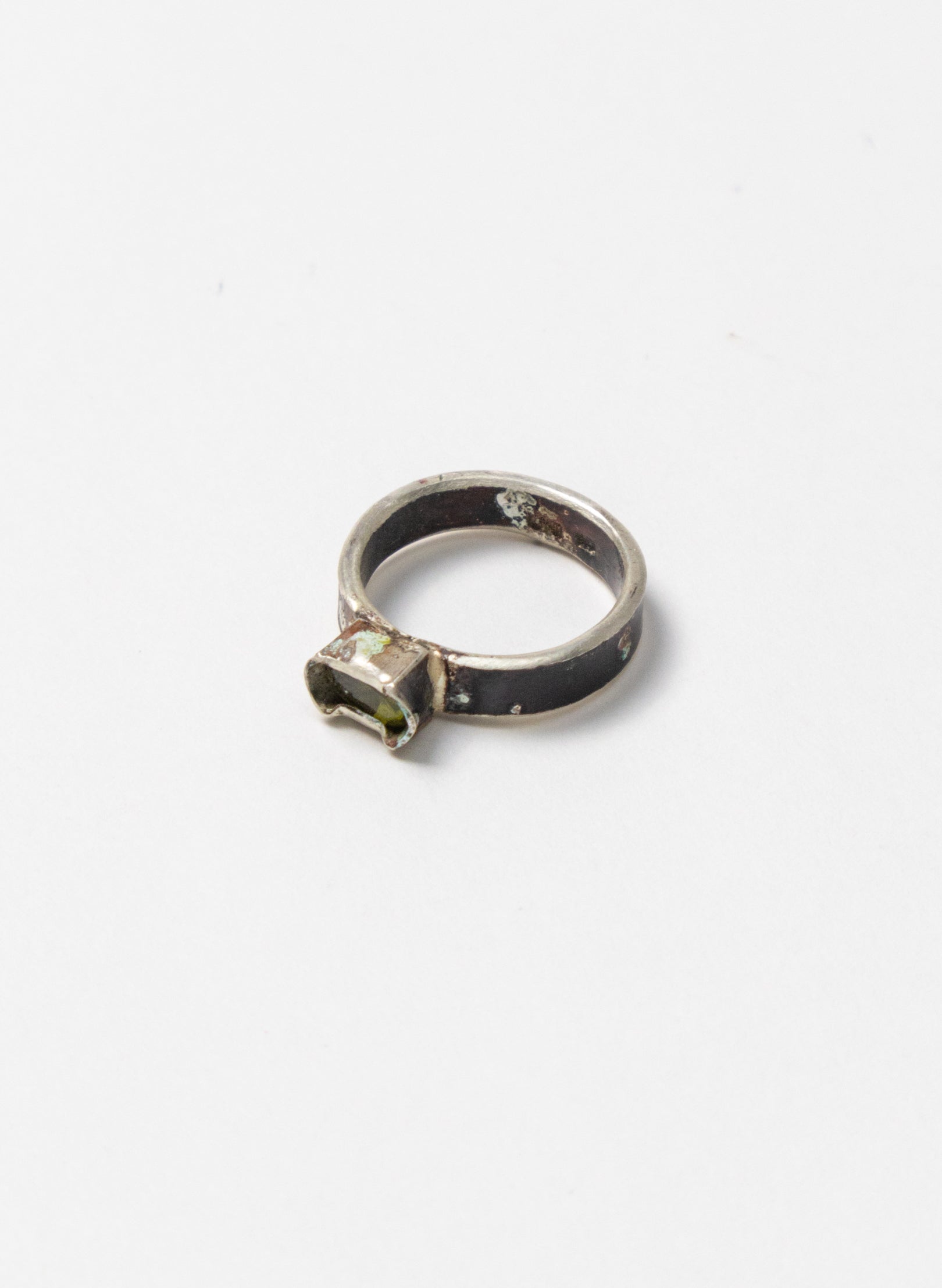 Green Peridot and Titanium Ring