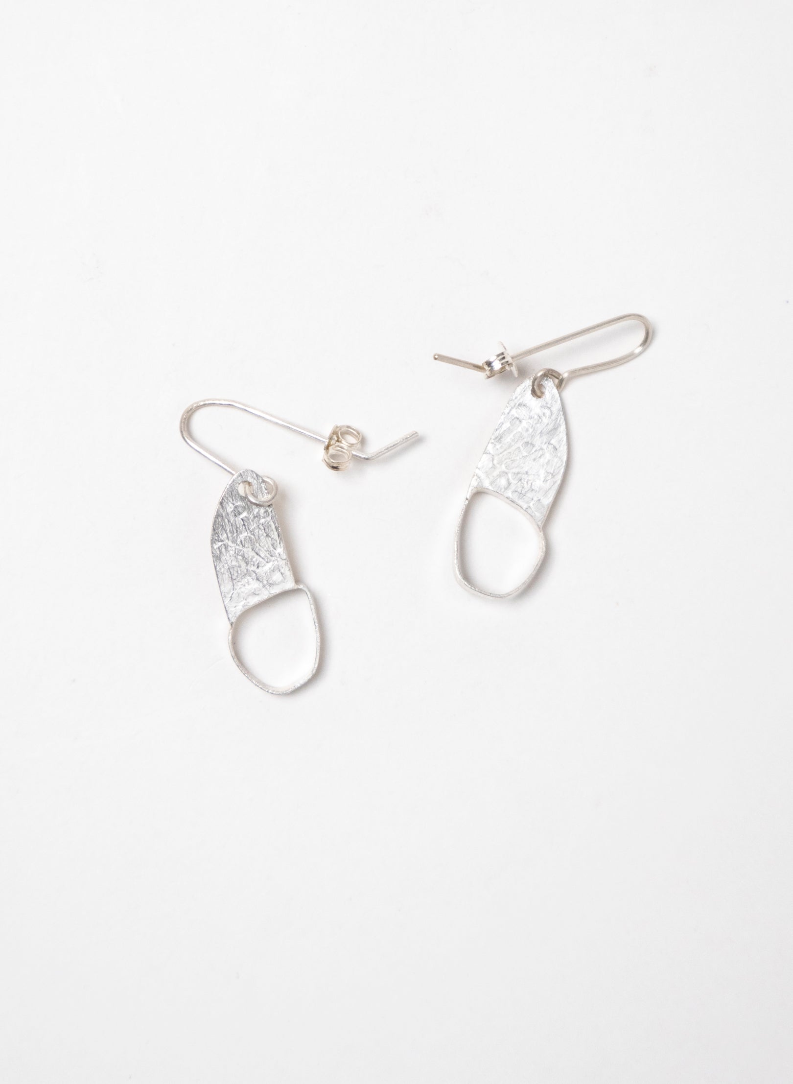 Hollow Single Pebble Earrings
