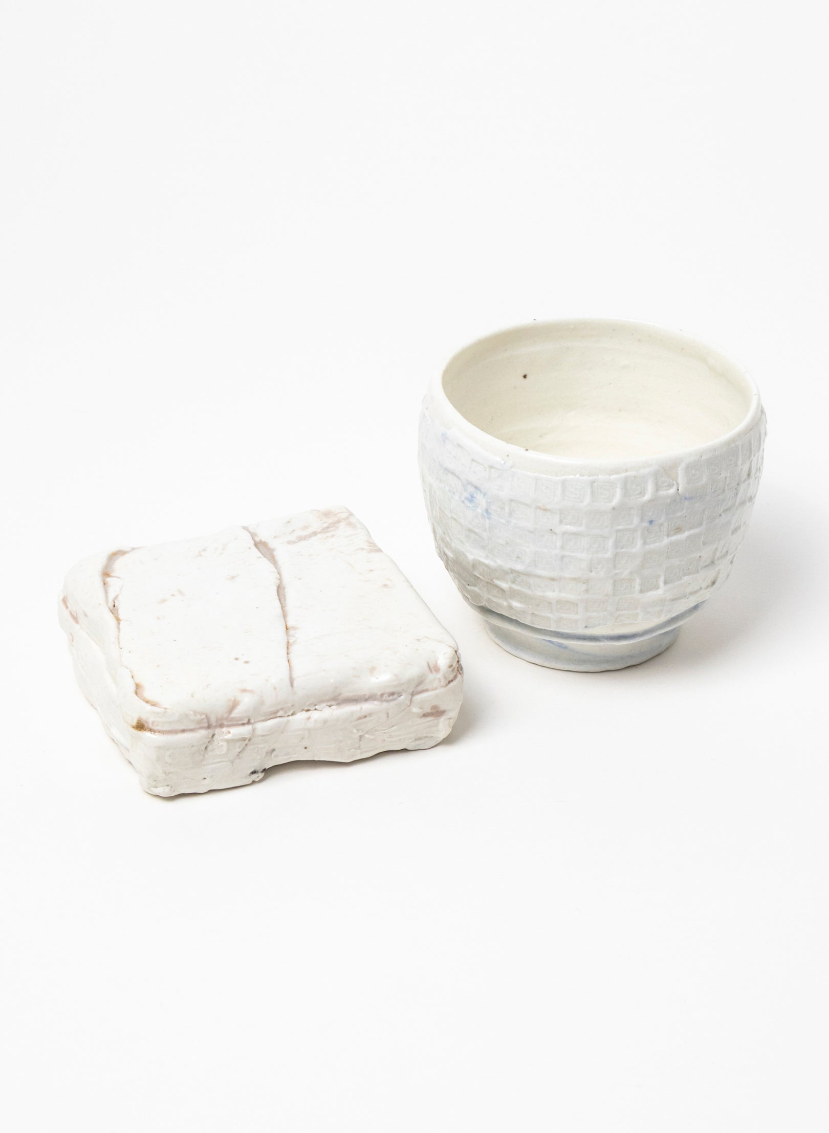 Ceramic Cup on Pedestal