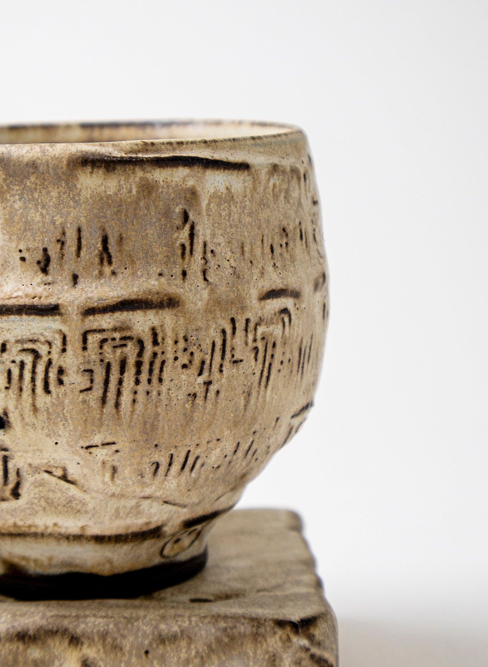 White Ceramic Cup on Pedestal