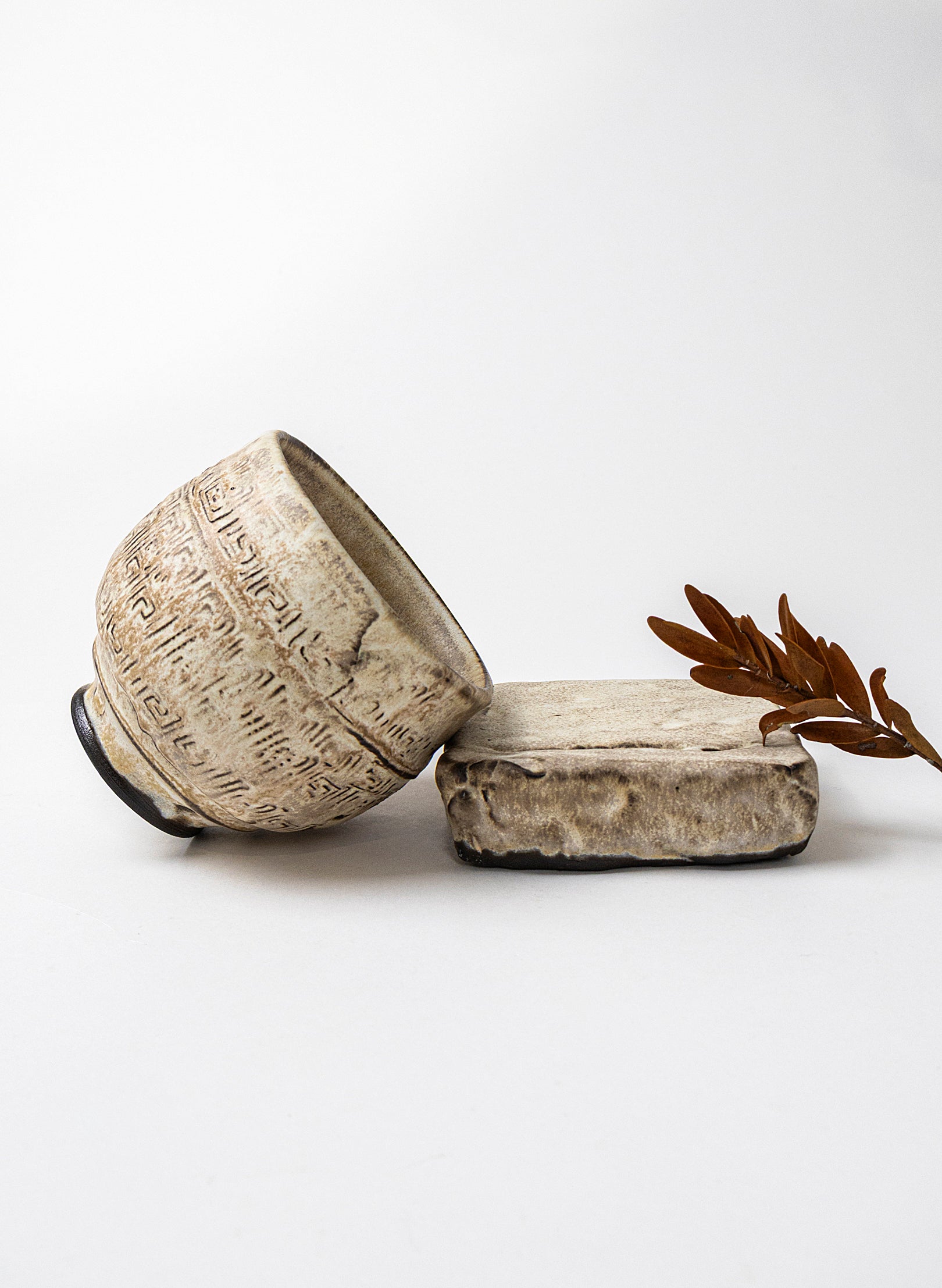 White Ceramic Cup on Pedestal