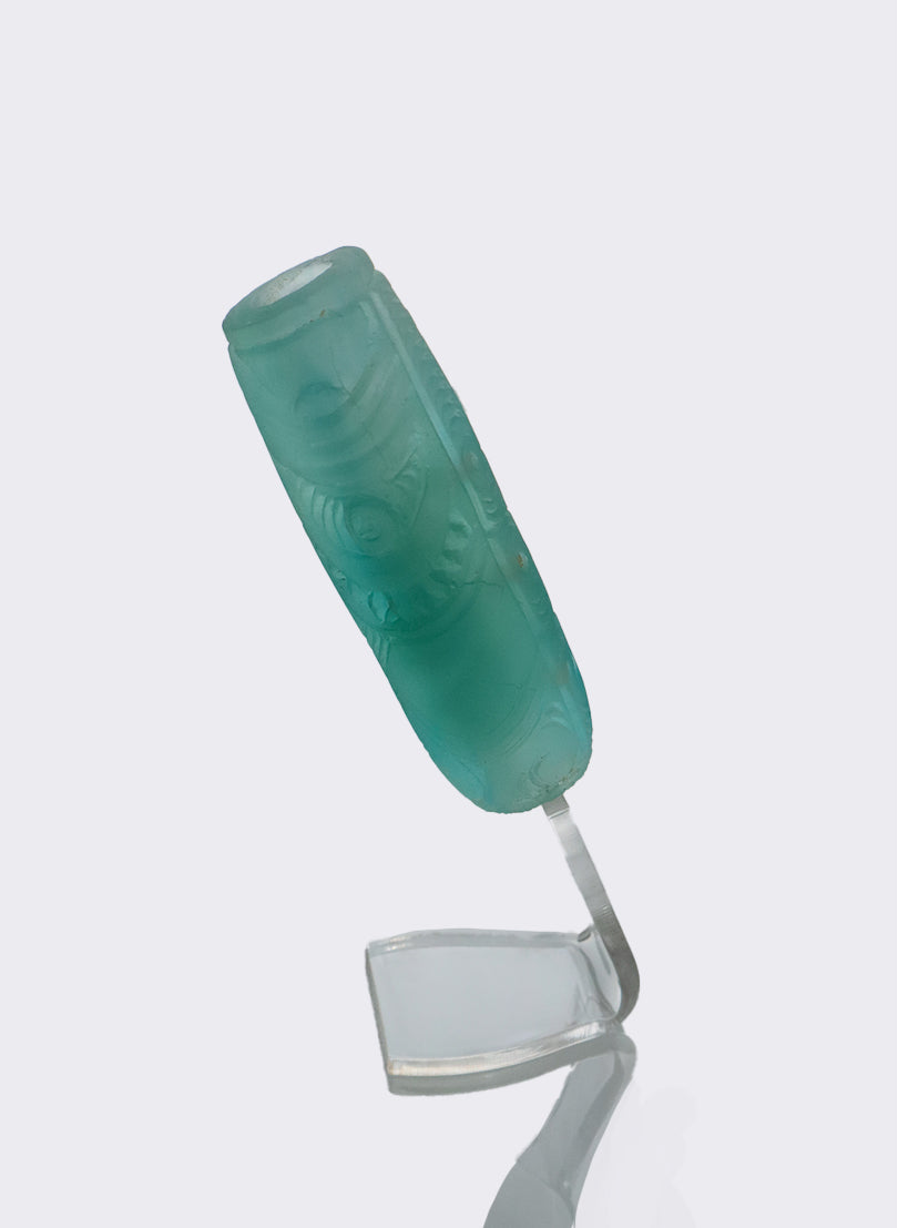 Cast Glass Koauau - teal green on a perspex stand