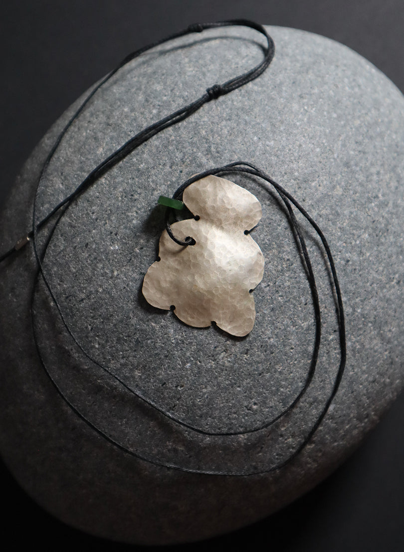 Sterling Silver and Pounamu Tiki Necklace