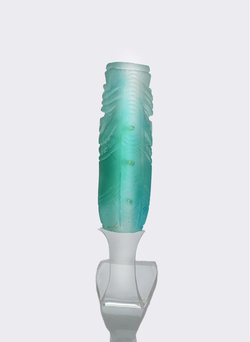 Cast Glass Koauau - teal green on a perspex stand