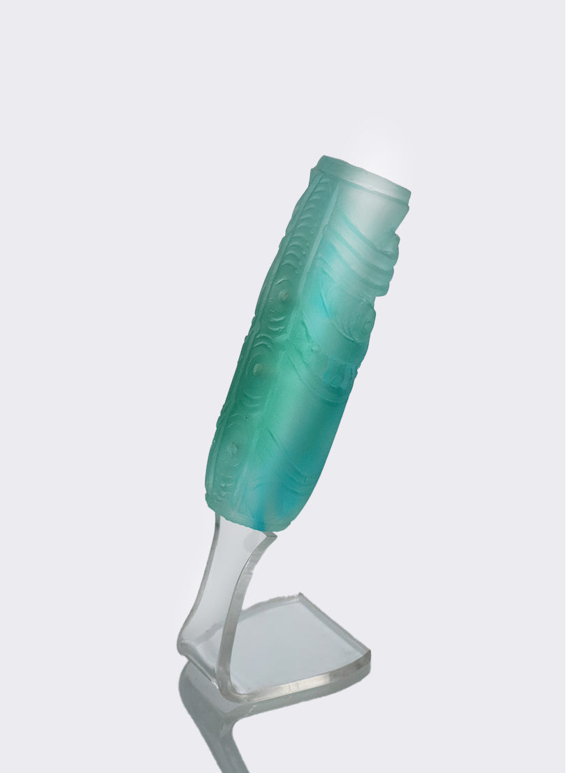 Cast Glass Koauau - teal green on a perspex stand