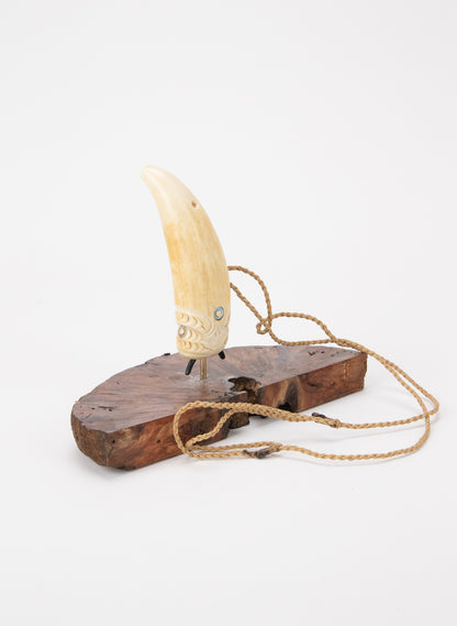 Carved Whalebone Nguru on a Stand