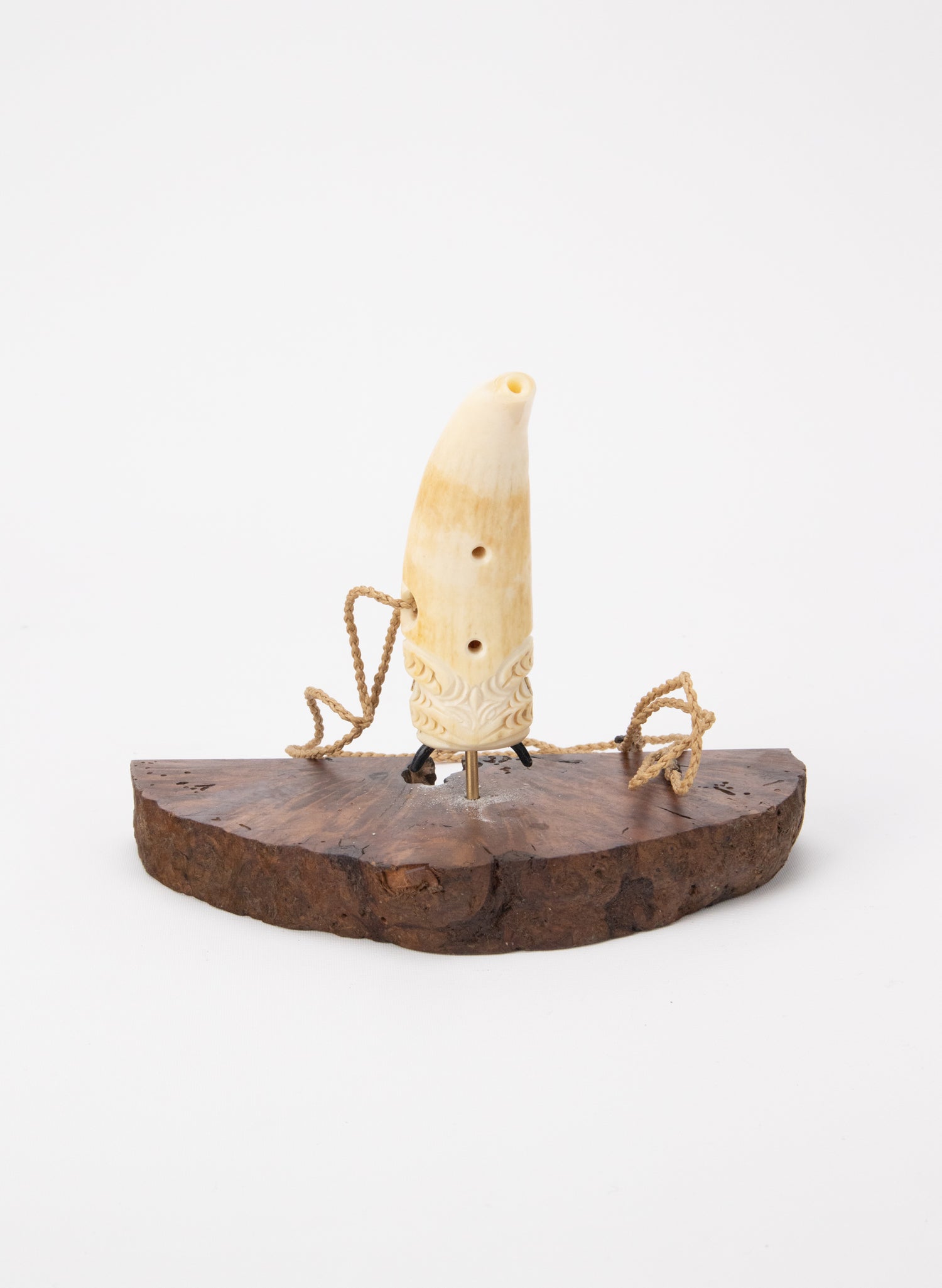 Carved Whalebone Nguru on a Stand