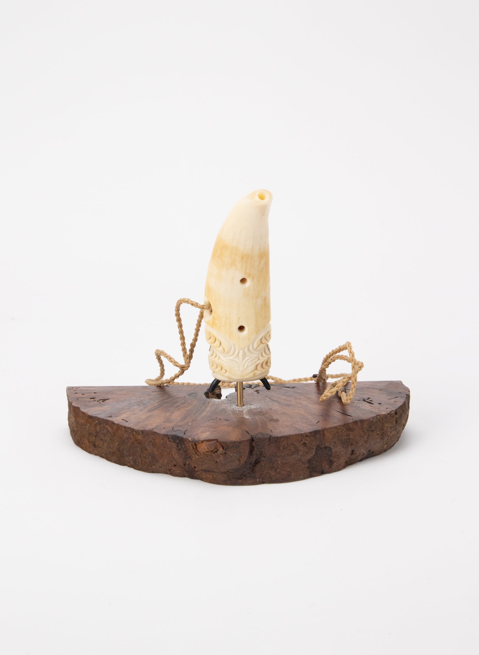 Carved Whalebone Nguru on a Stand