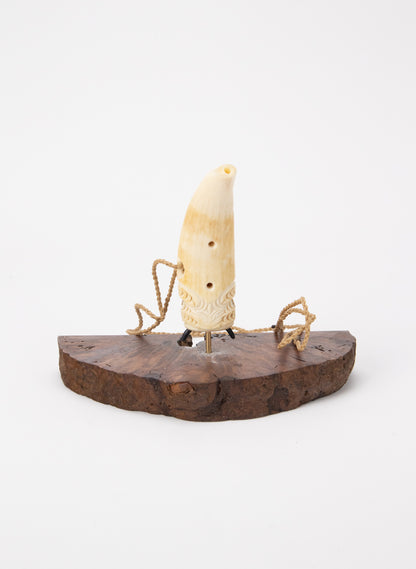 Carved Whalebone Nguru on a Stand