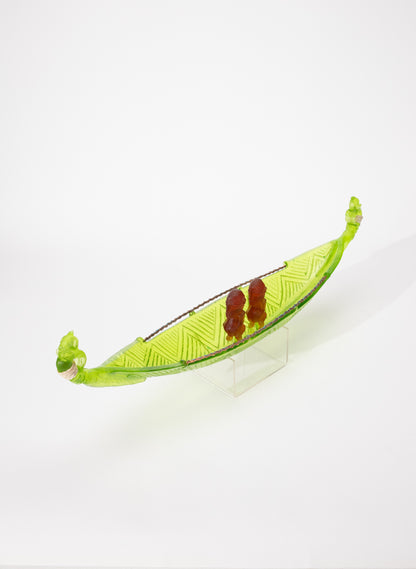 Green Manaia with standing Tangaroas