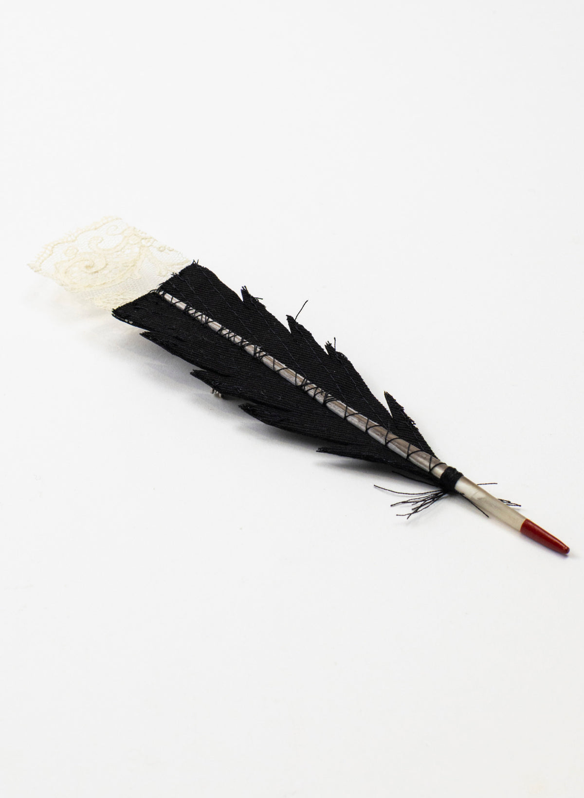 Single Huia Feather Brooch
