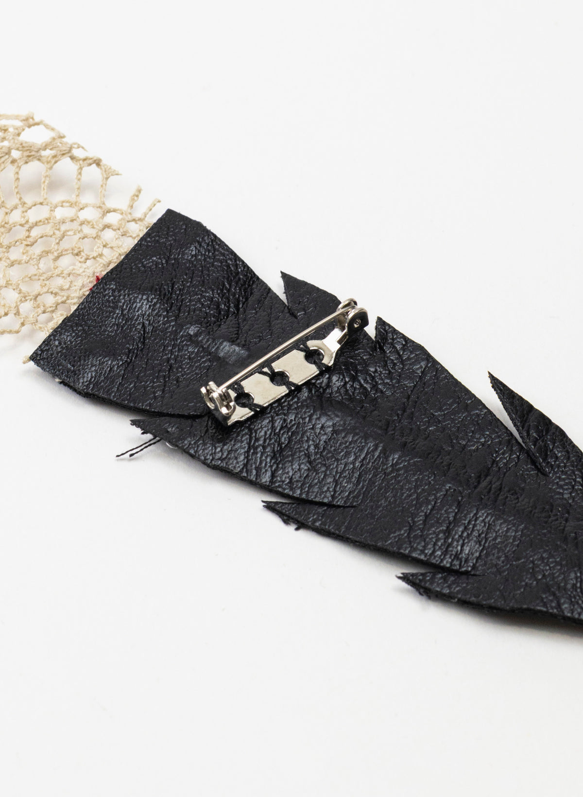 Single Huia Feather Brooch
