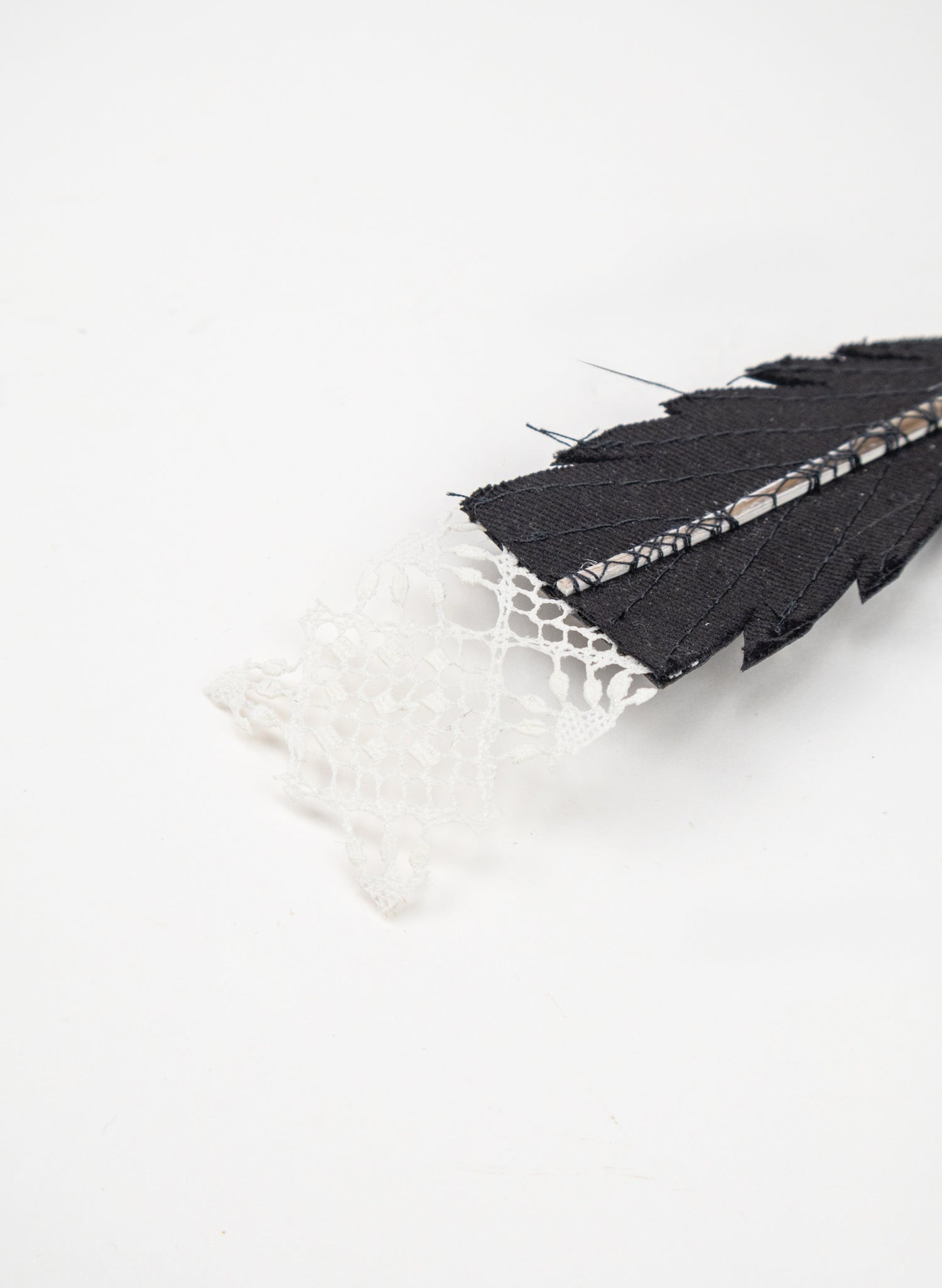 Single Huia Feather Brooch