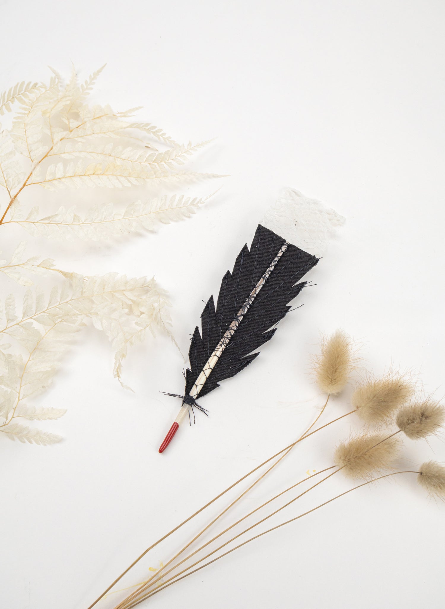 Single Huia Feather Brooch