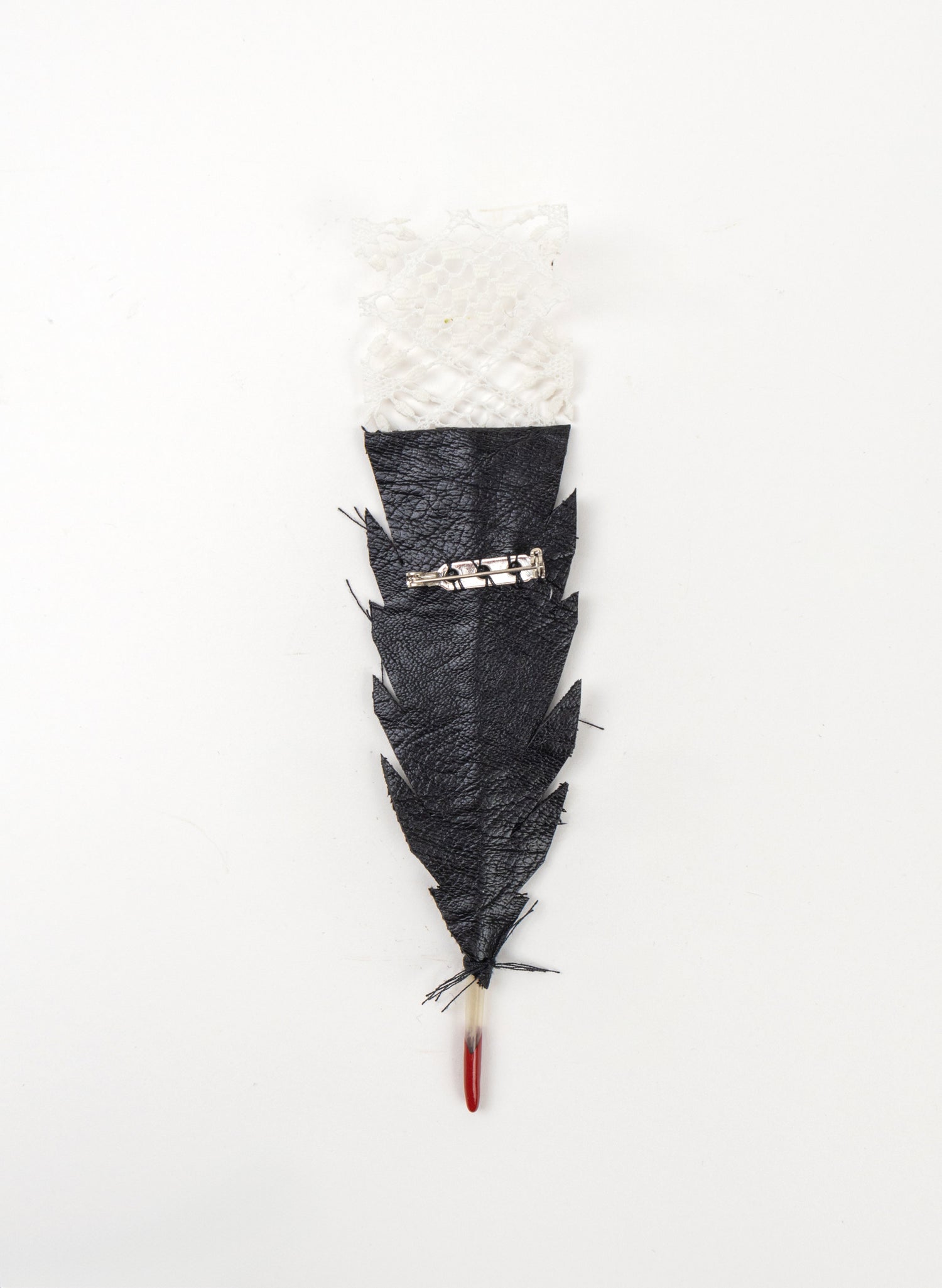 Single Huia Feather Brooch