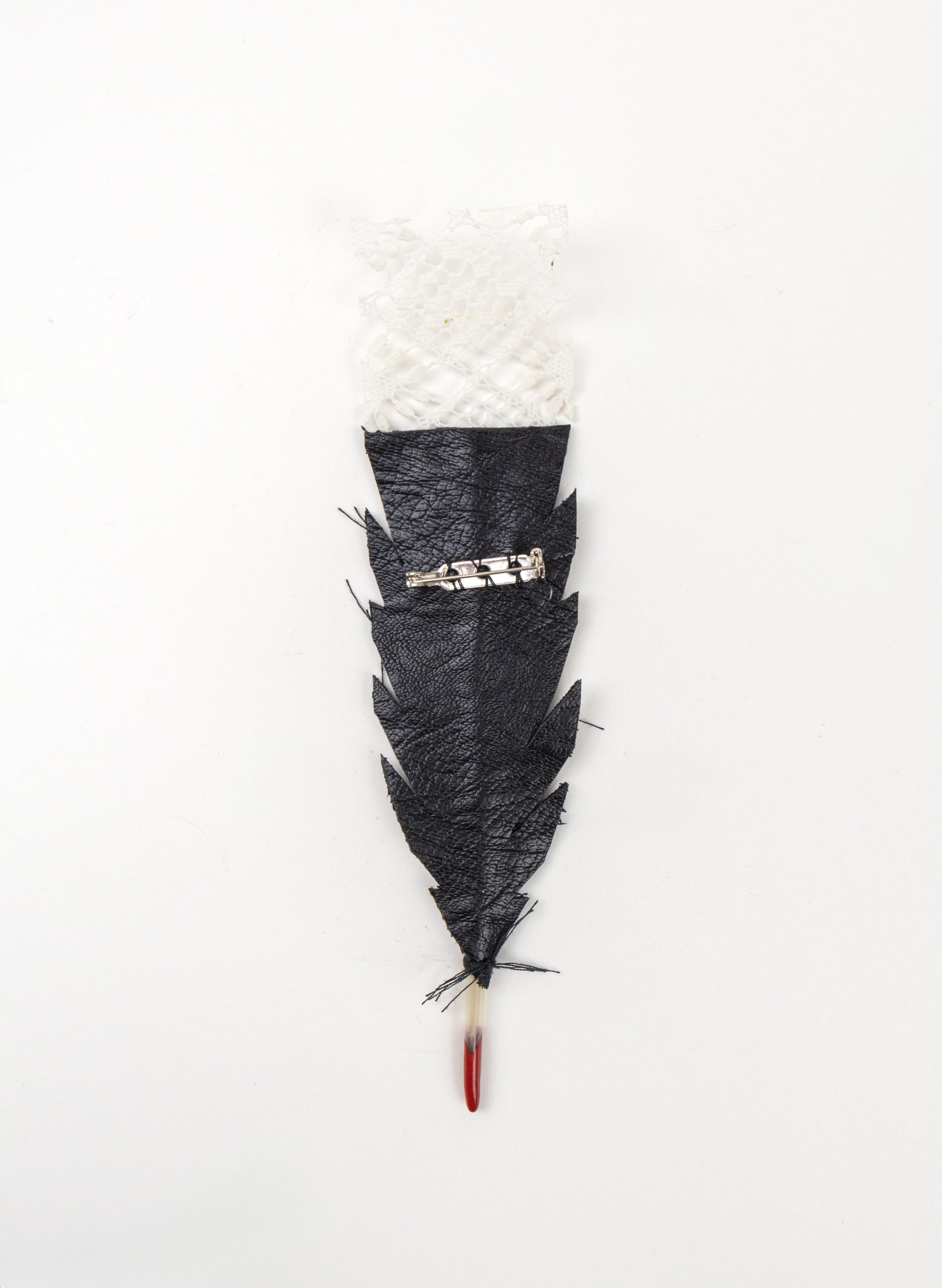Single Huia Feather Brooch