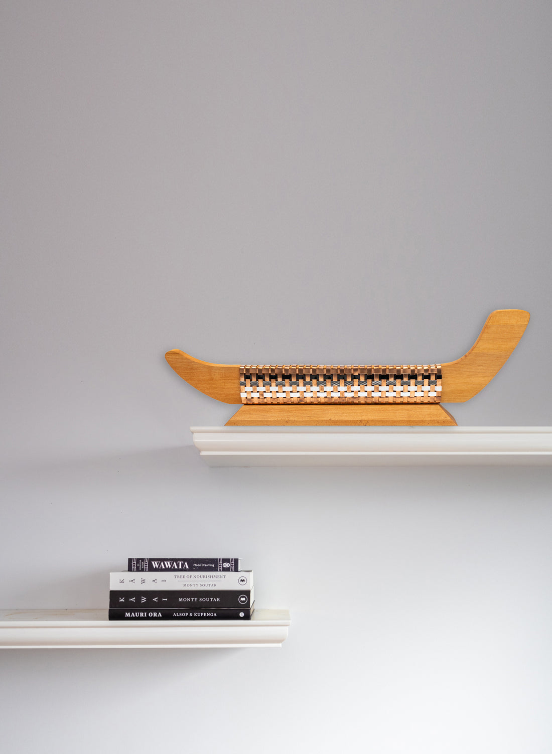 Black, White and Silver Waka on Plinth